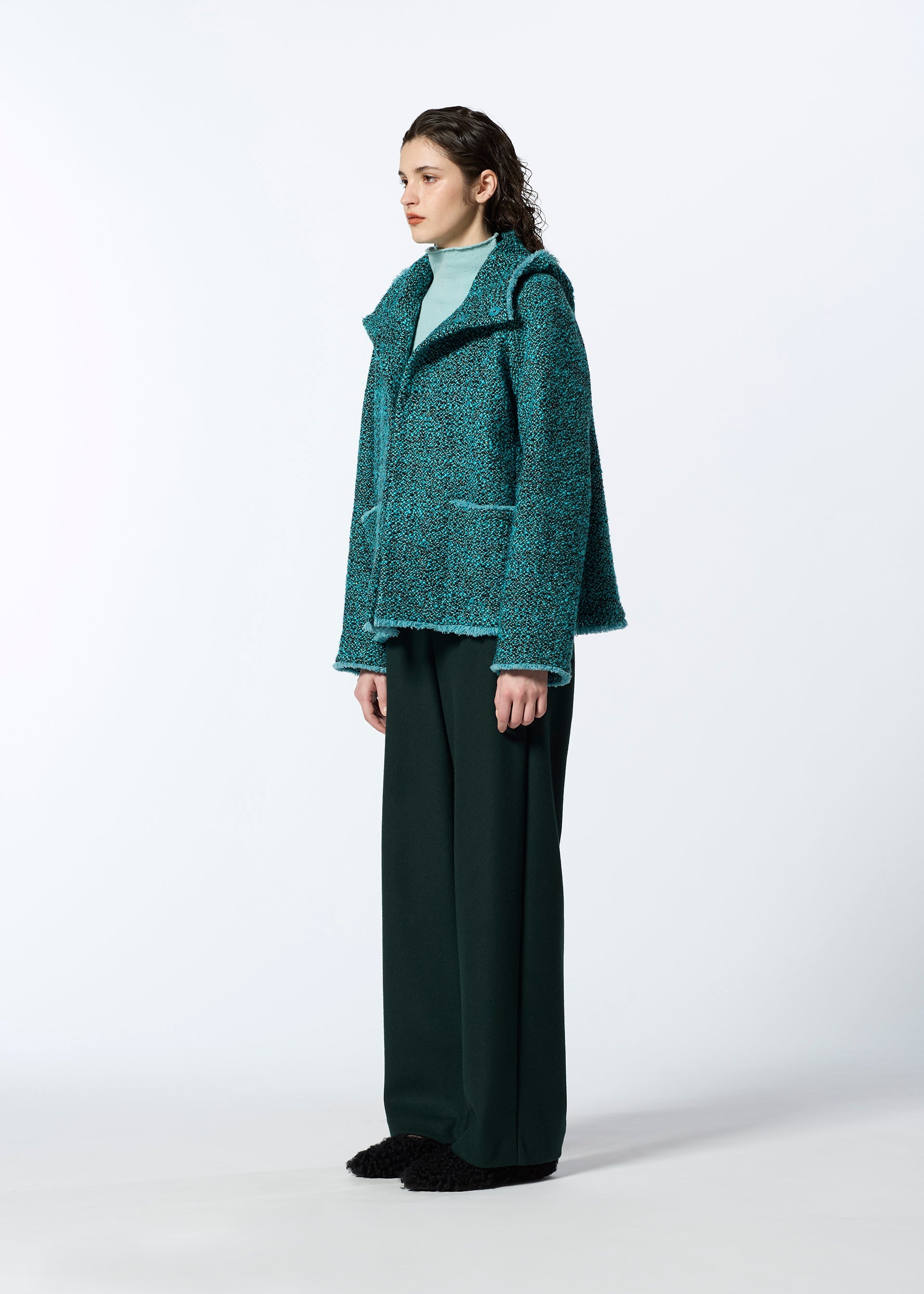 A model wears the HAAT ROVING NEP jacket.