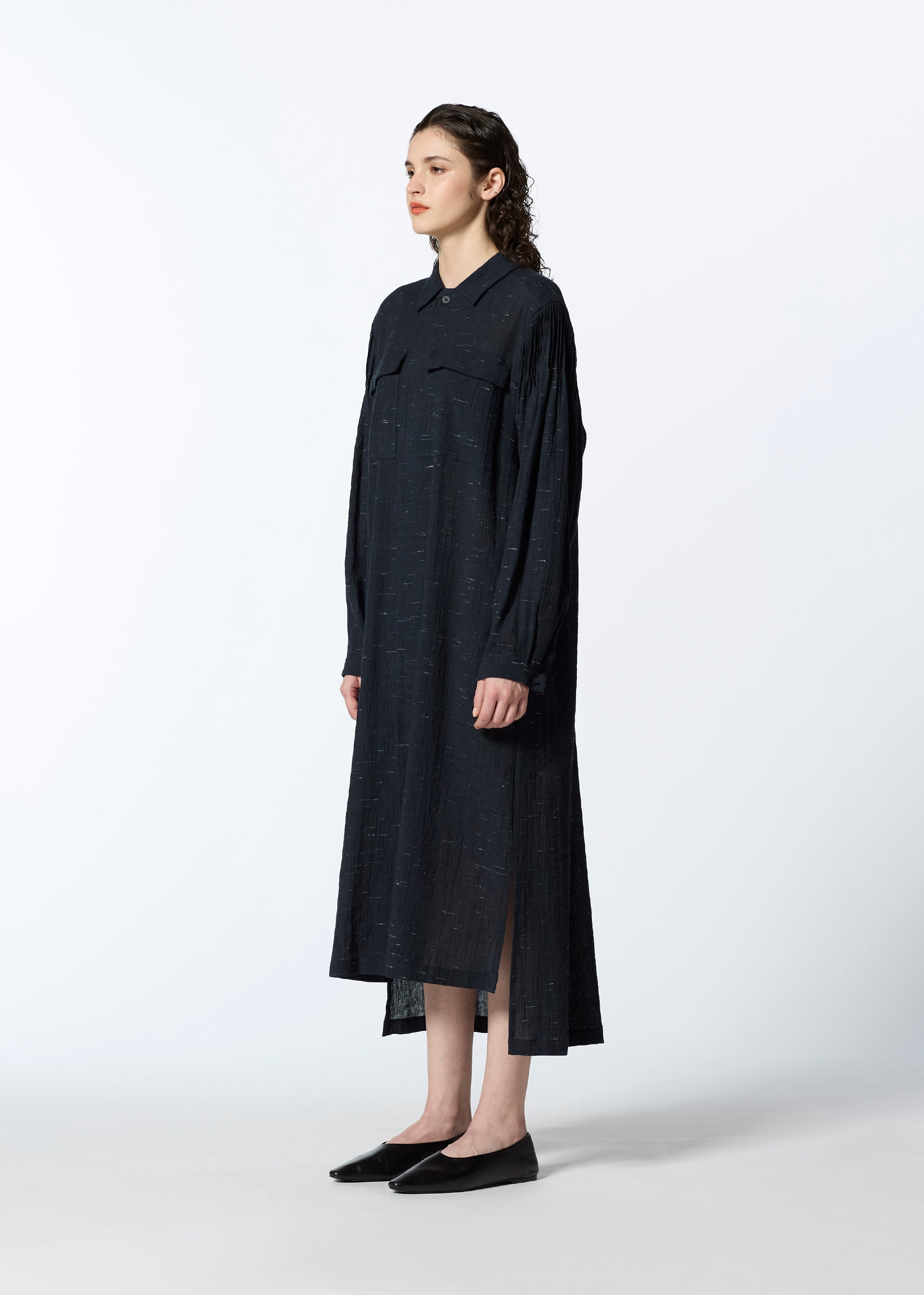 A model wears the HAAT PINTUCKING dress.