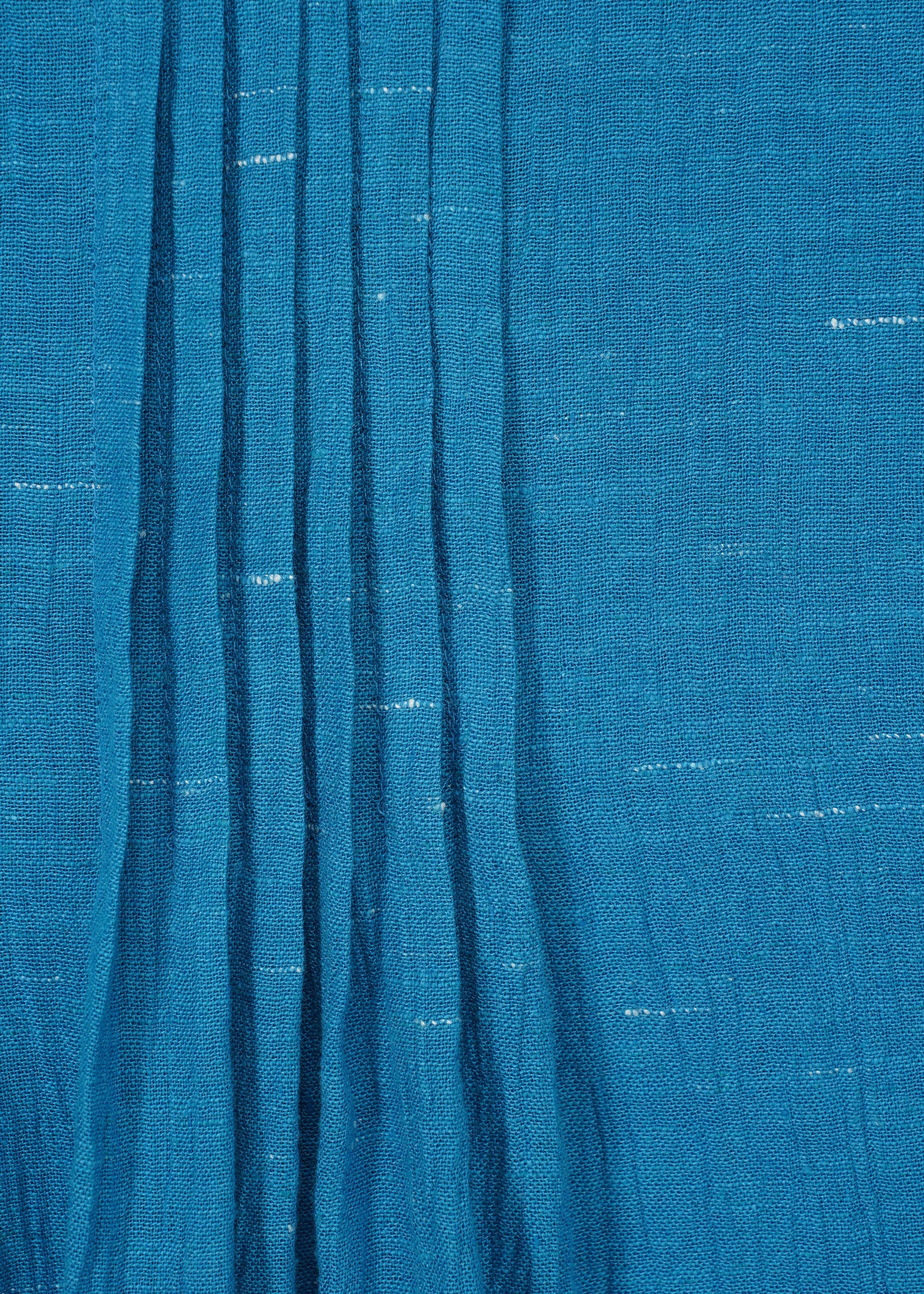 A detail shot of the HAAT PINTUCKING dress.