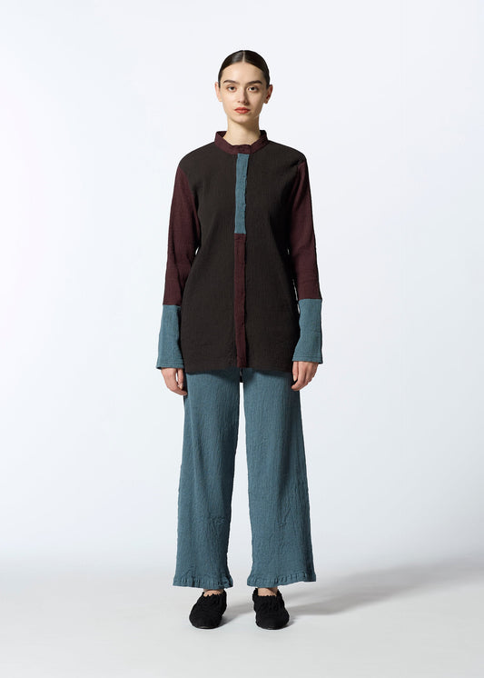 A model wears the HAAT KYO CHIJIMI COMBINATION shirt.