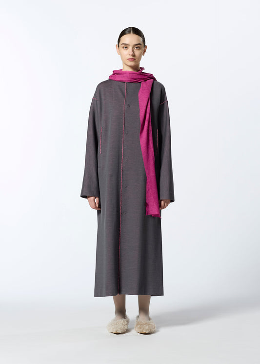A model wears the HAAT EDGE LINE dress.