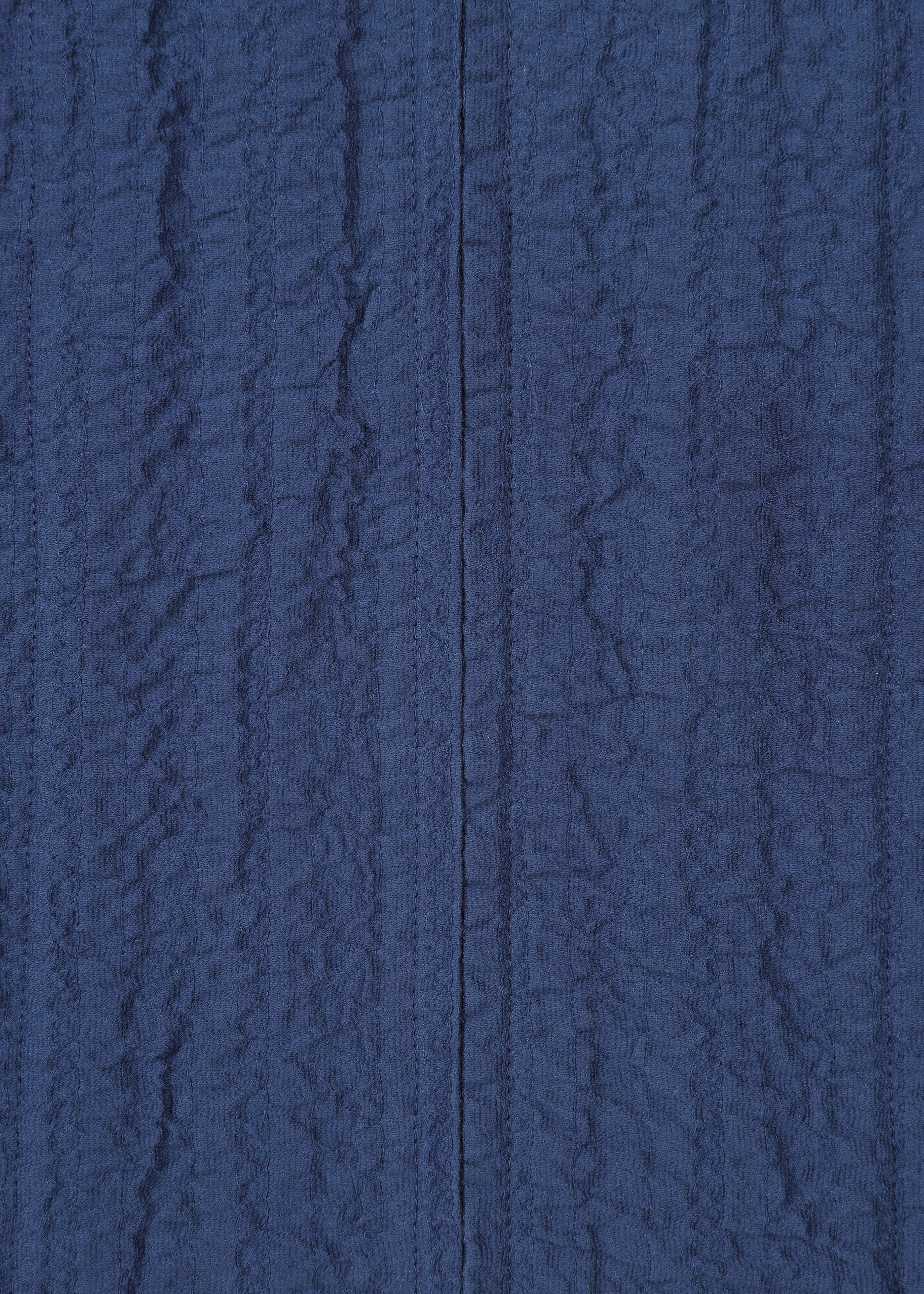 A detail shot of the HAAT RASCHEL ASSEMBLY cardigan.