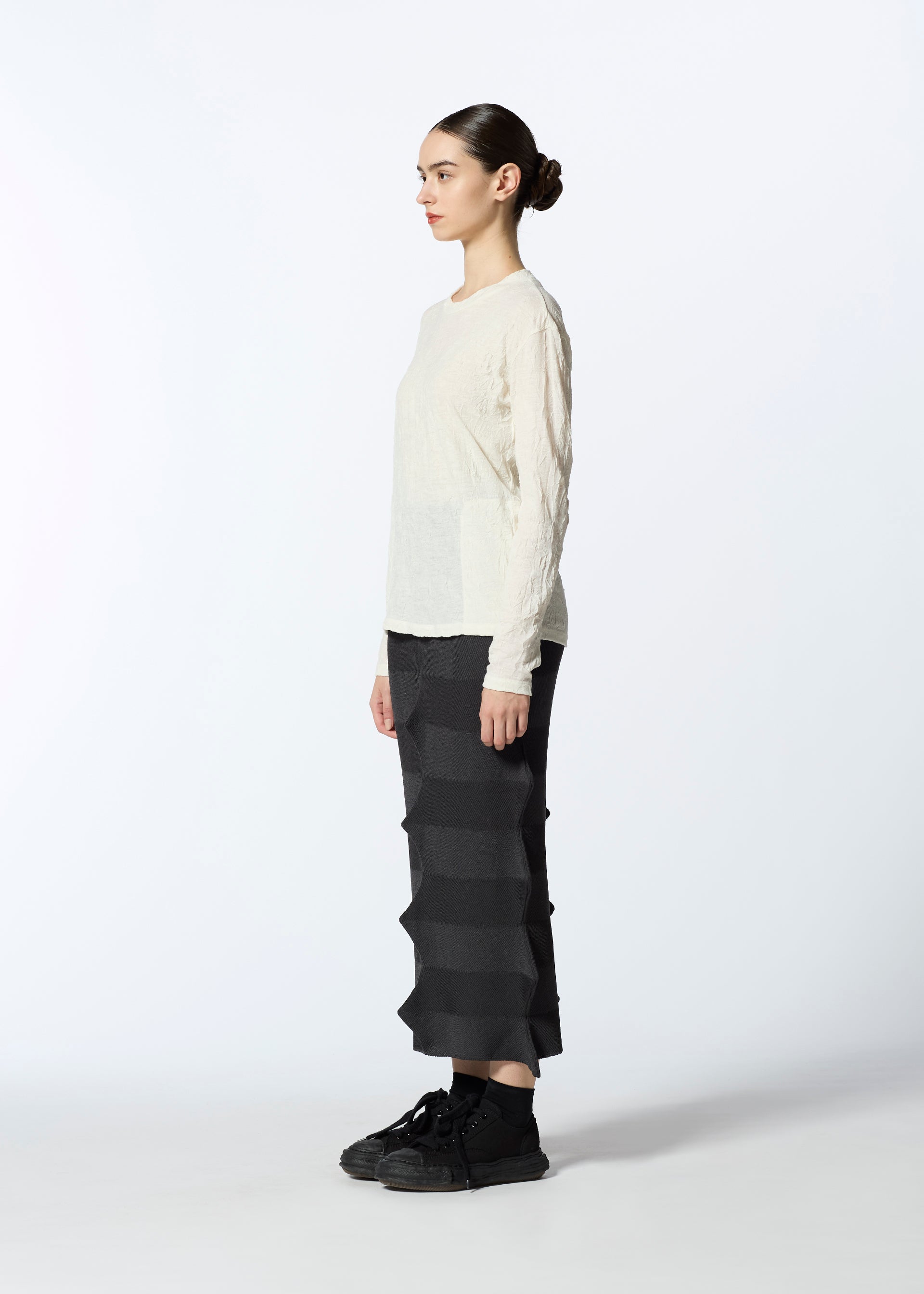 A model wears the HAAT 2001 FROM skirt.