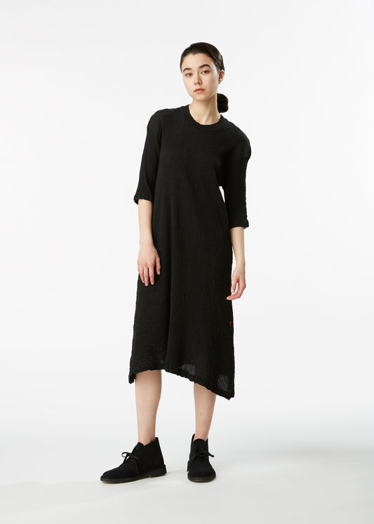 A model wears the HAAT KYO CHIJIMI BASIC dress