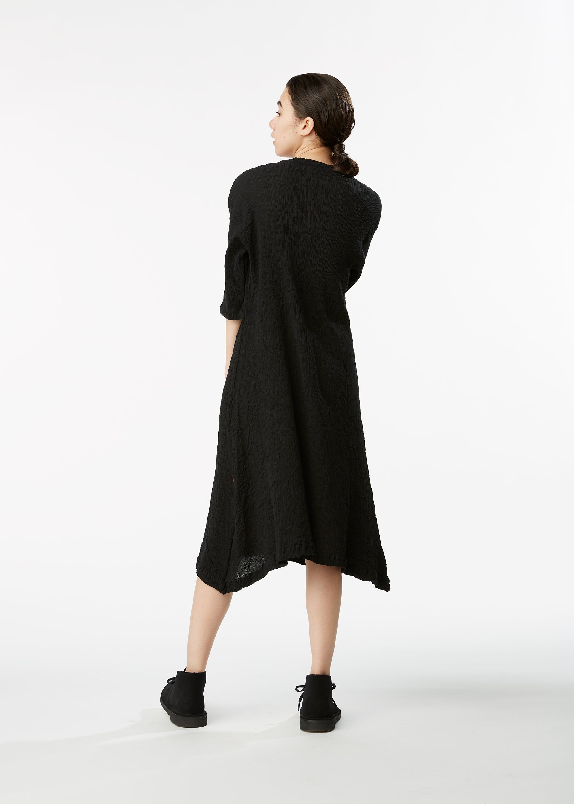 A model wears the HAAT KYO CHIJIMI BASIC dress