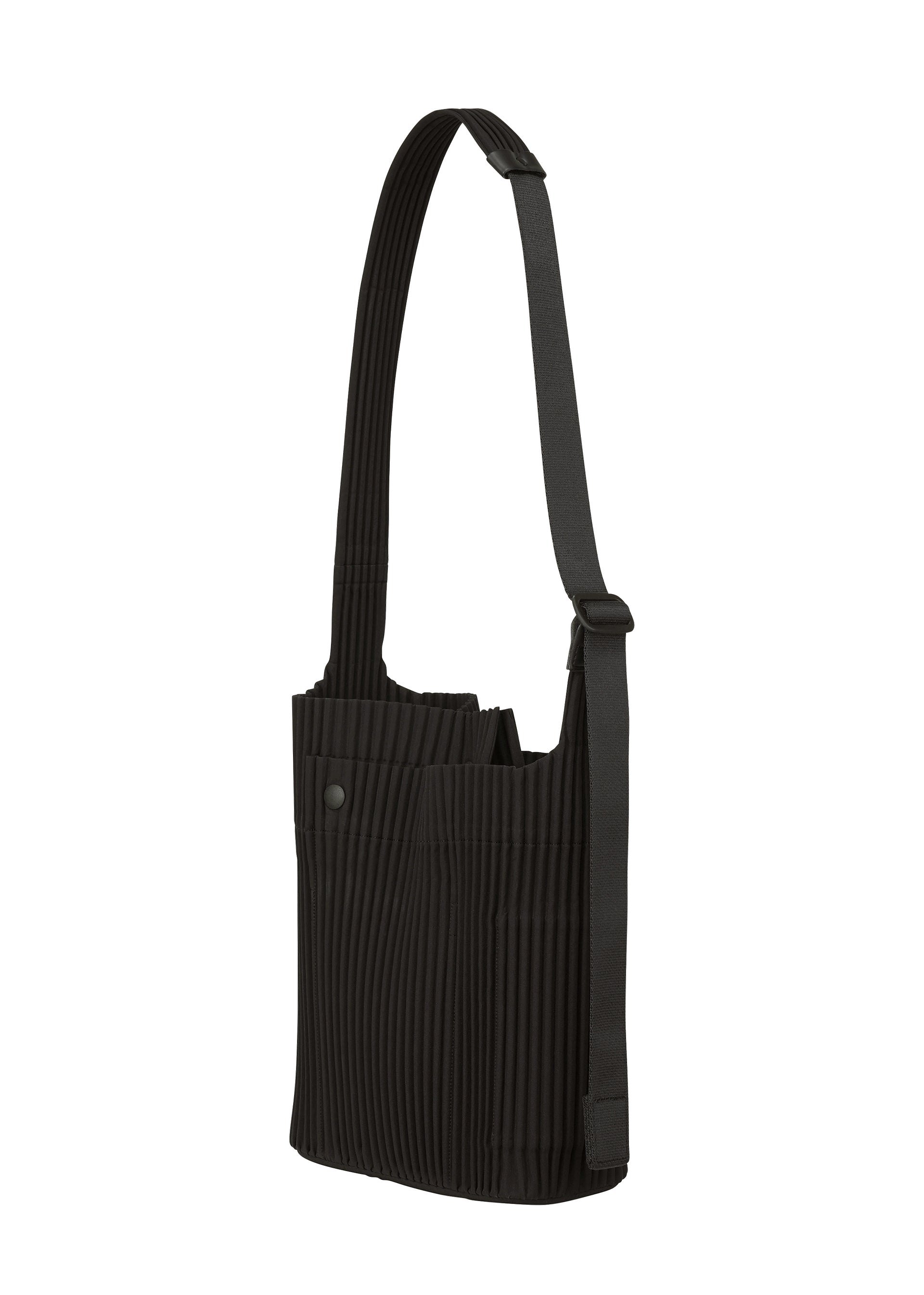 A detail shot of the HOMME PLISSÉ ISSEY MIYAKE UTILITY bag