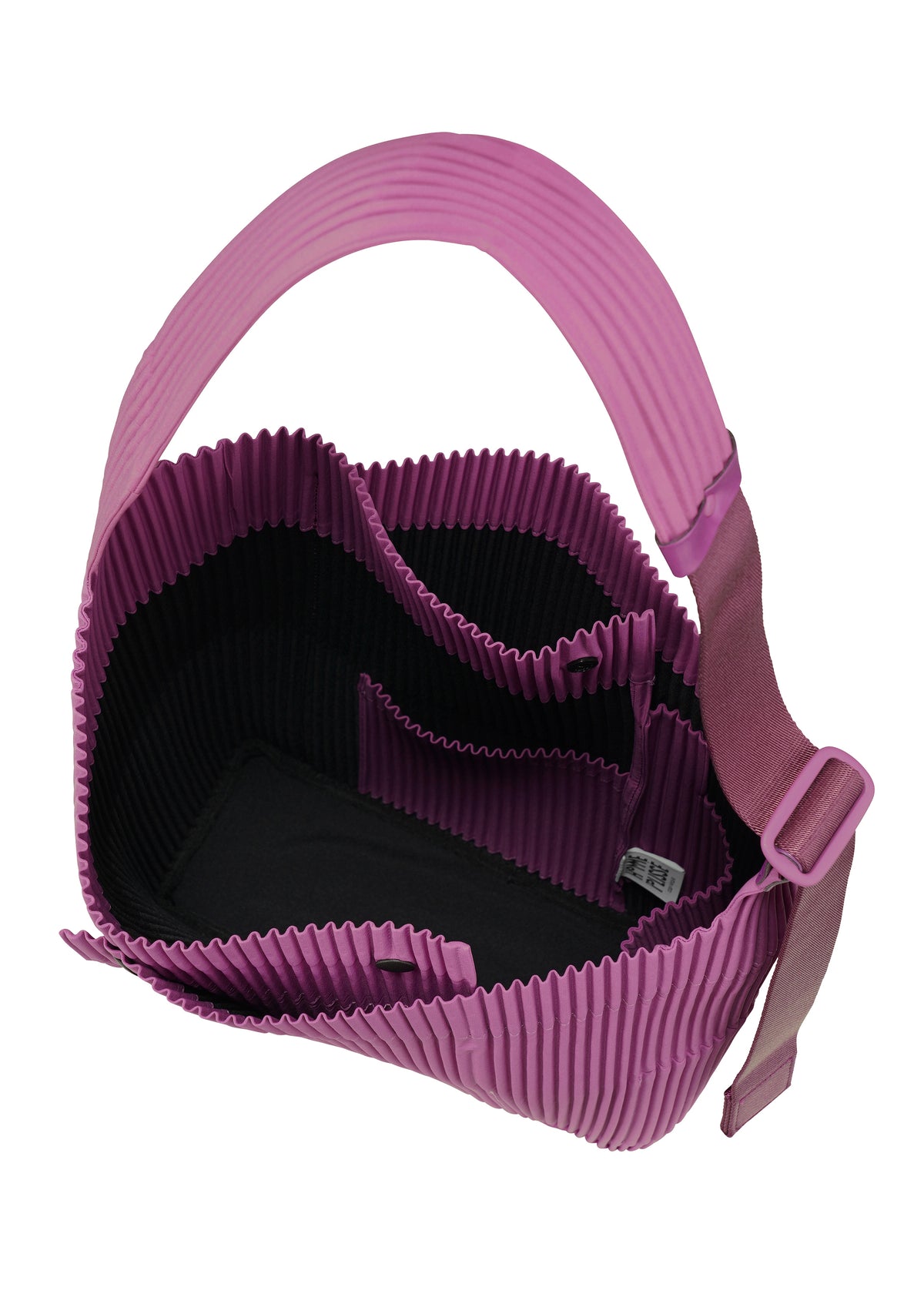 A detail shot of the HOMME PLISSÉ ISSEY MIYAKE UTILITY bag