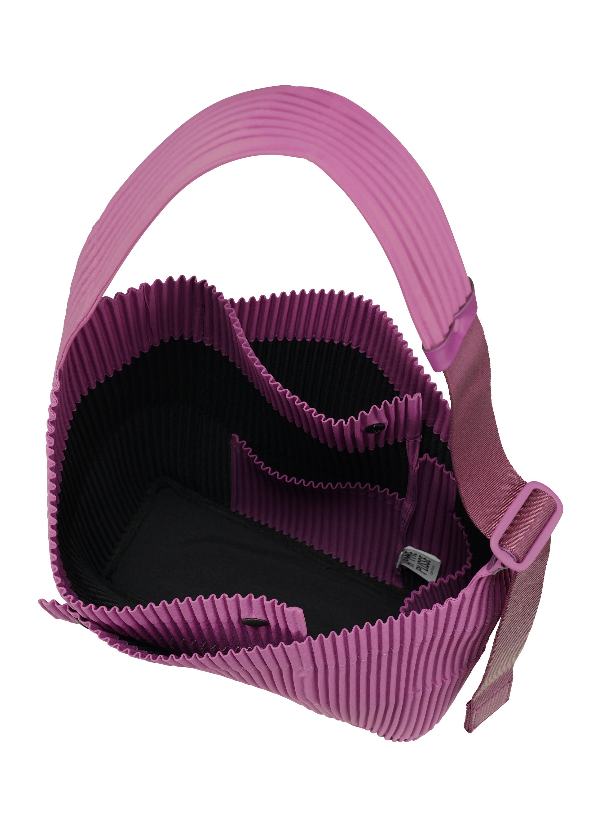 A detail shot of the HOMME PLISSÉ ISSEY MIYAKE UTILITY bag
