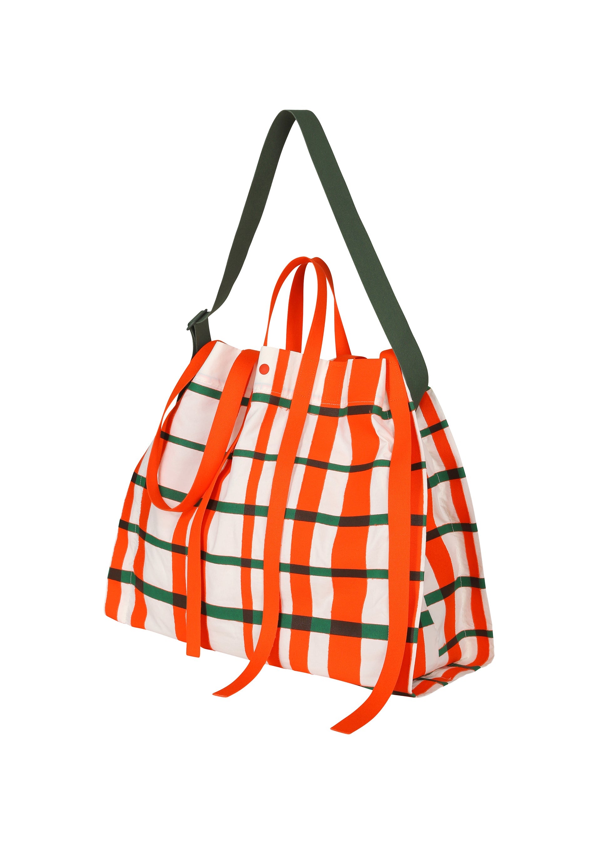 A detail shot of the HOMME PLISSÉ ISSEY MIYAKE WINDSWEPT PLAID BAG bag.
