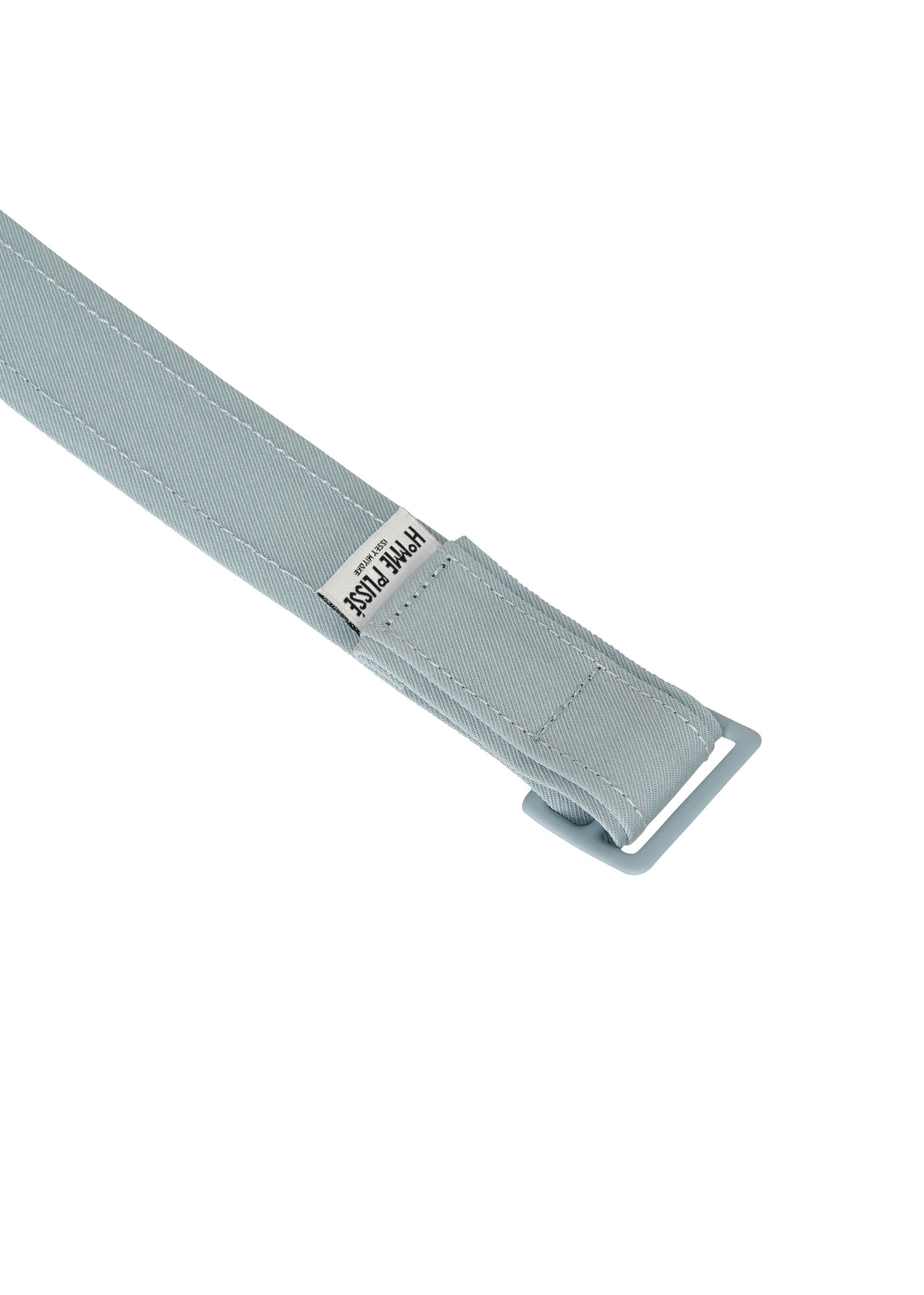 A detail shot of the HOMME PLISSÉ ISSEY MIYAKE WRAP BELT belt.