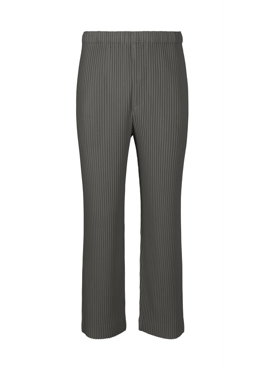 A product shot of the HOMME PLISSÉ ISSEY MIYAKE MC MARCH trousers in charcoal grey (13).