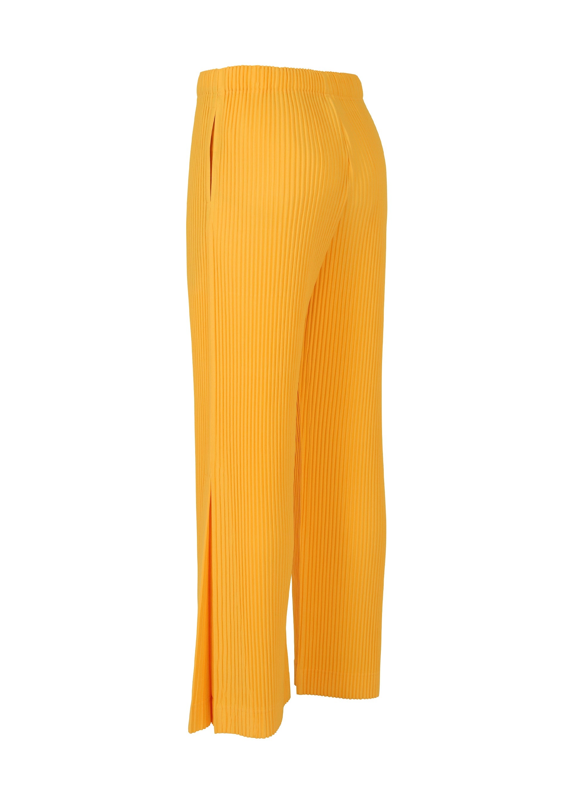 A detail shot of the HOMME PLISSÉ ISSEY MIYAKE PLEATS BOTTOMS 3 trousers.