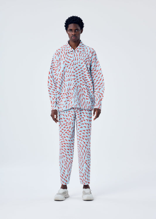 A model wears the HOMME PLISSÉ ISSEY MIYAKE WIND SPEED trousers.