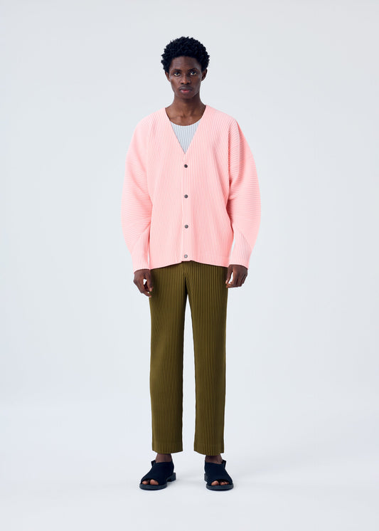 A model wears the HOMME PLISSÉ ISSEY MIYAKE MC APRIL shirt.