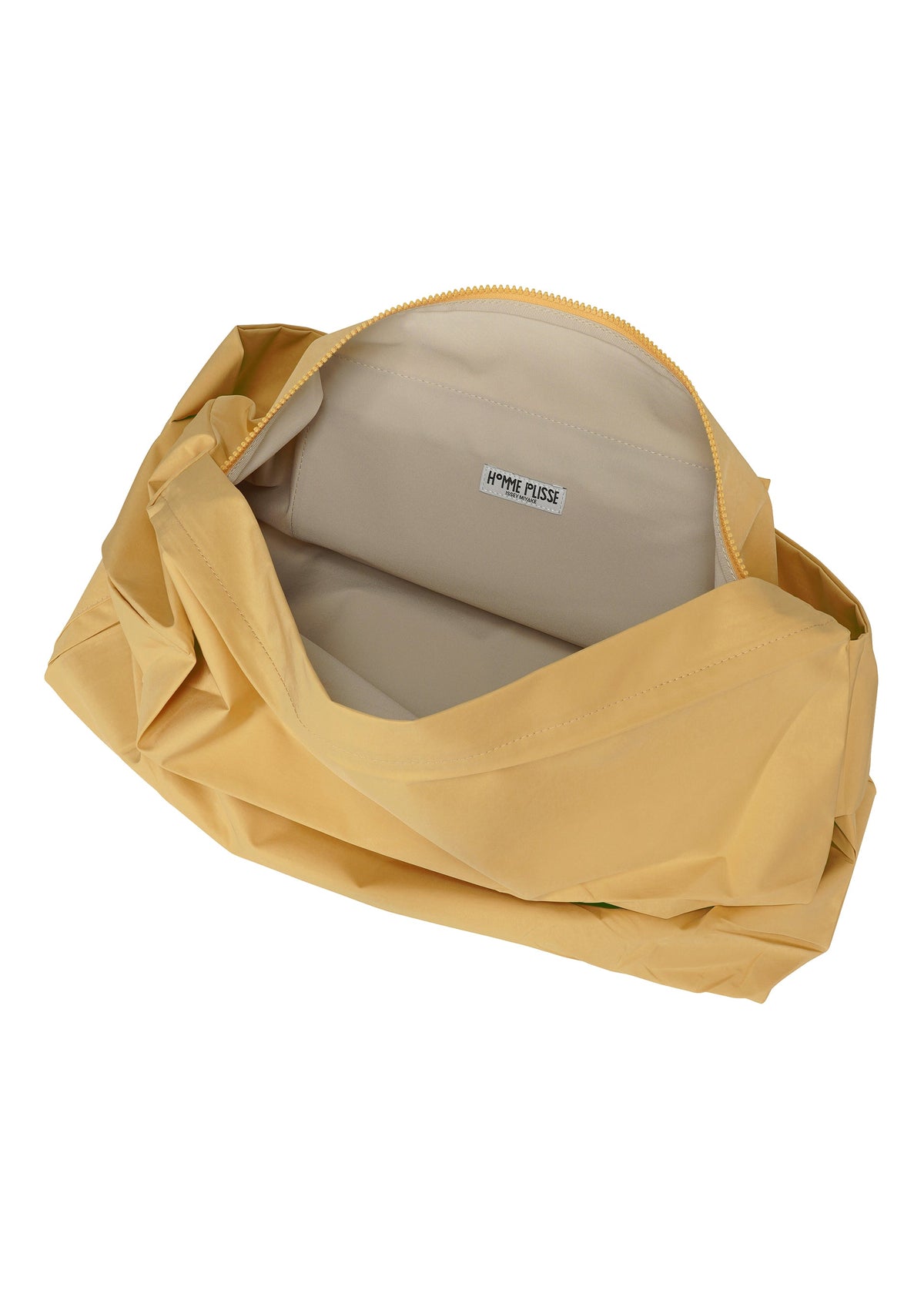 A detail shot of the HOMME PLISSÉ ISSEY MIYAKE STONE BAG bag.