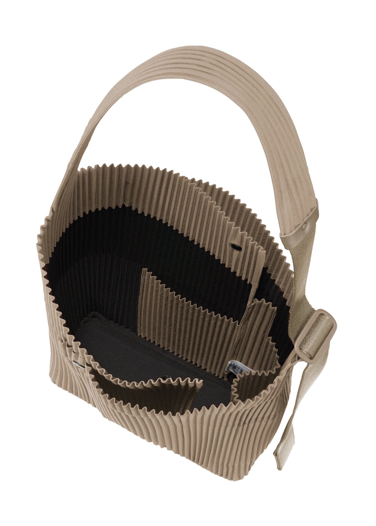 A detail shot of the HOMME PLISSÉ ISSEY MIYAKE UTILITY bag.