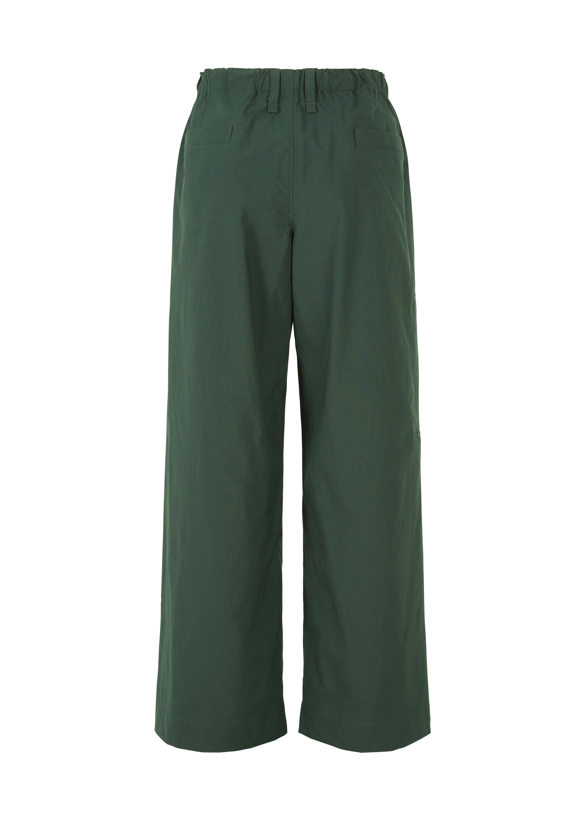 A detail shot of the HOMME PLISSÉ ISSEY MIYAKE QUARRY PANTS trousers.