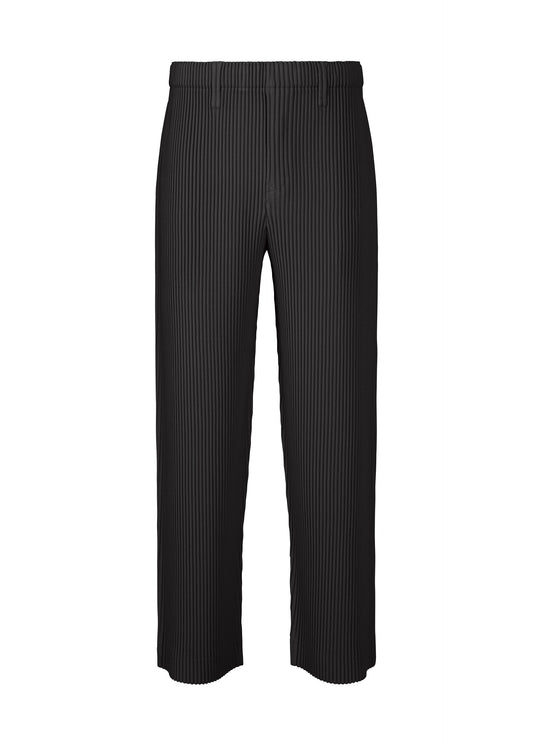 A product shot of the HOMME PLISSÉ ISSEY MIYAKE KERSEY PLEATS trousers in black (15).