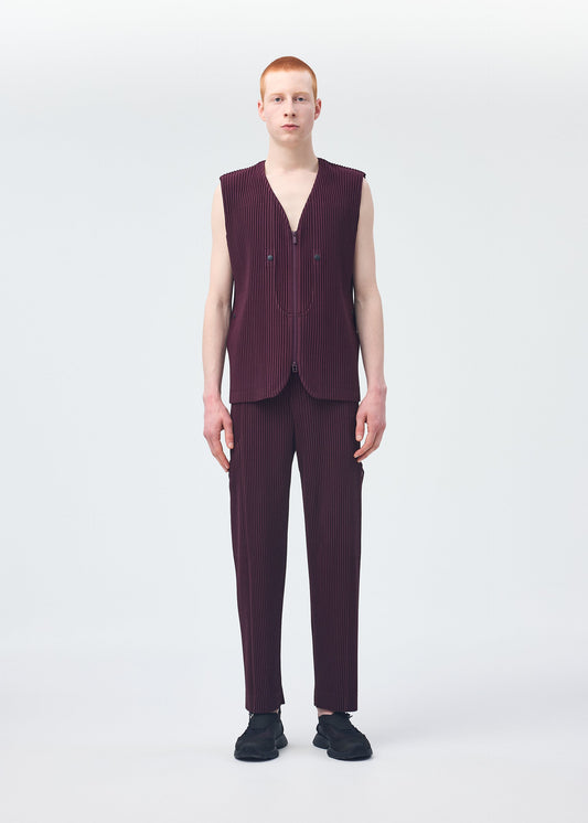 A model wears the HOMME PLISSÉ ISSEY MIYAKE QUARRY vest.