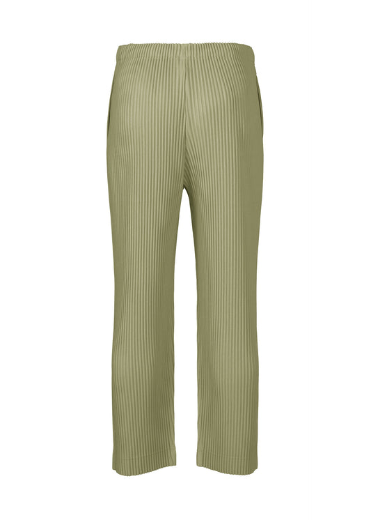 A detail shot of the HOMME PLISSÉ ISSEY MIYAKE MONTHLY COLORS NOVEMBER trousers.