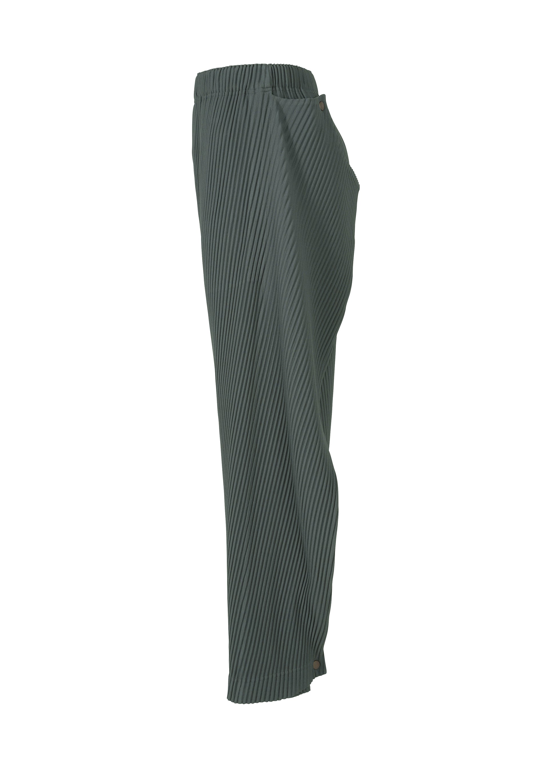 A detail shot of the HOMME PLISSÉ ISSEY MIYAKE ANGULAR STONE trousers.