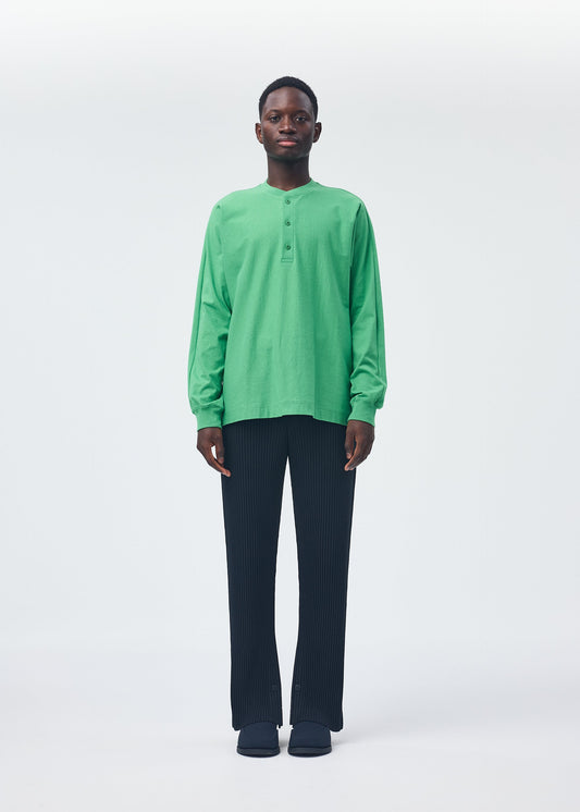 A model wears the HOMME PLISSÉ ISSEY MIYAKE RELEASE T 1 top.