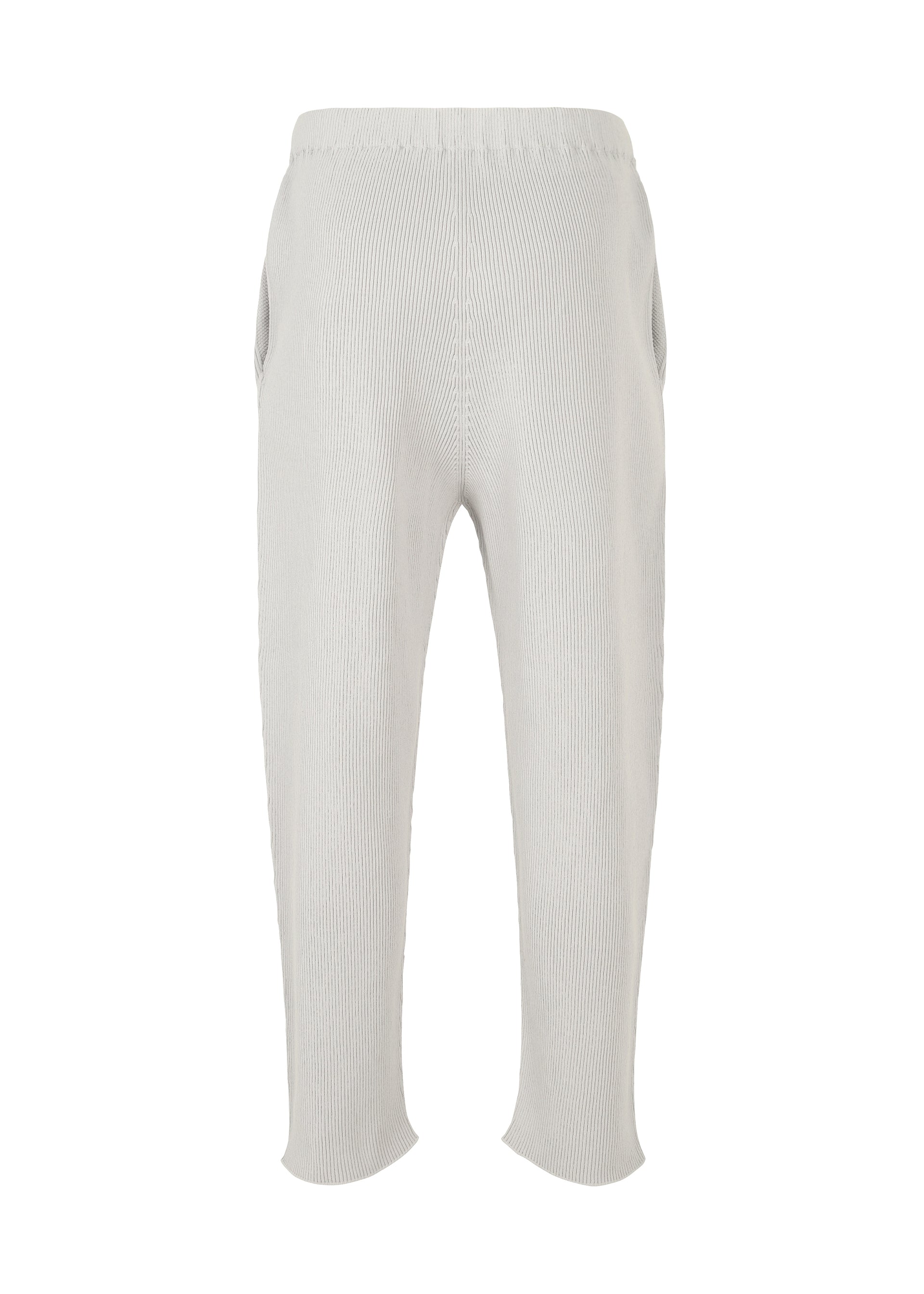 A detail shot of the HOMME PLISSÉ ISSEY MIYAKE BASIC KNIT trousers.