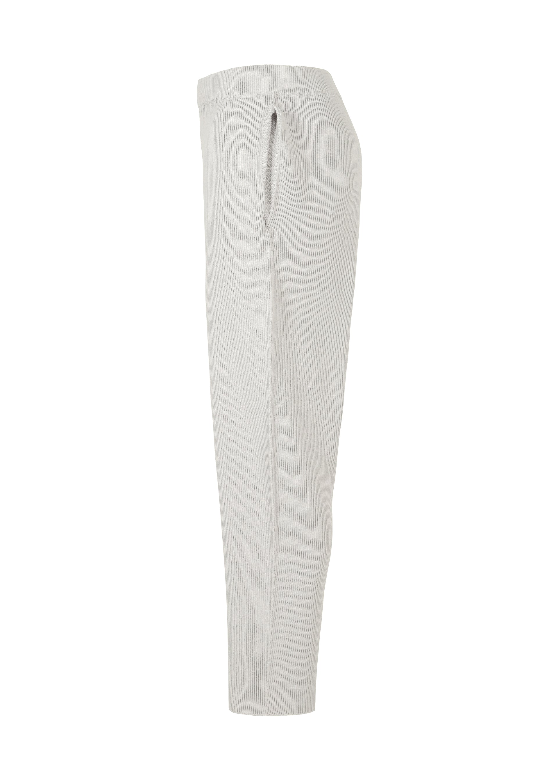 A detail shot of the HOMME PLISSÉ ISSEY MIYAKE BASIC KNIT trousers.