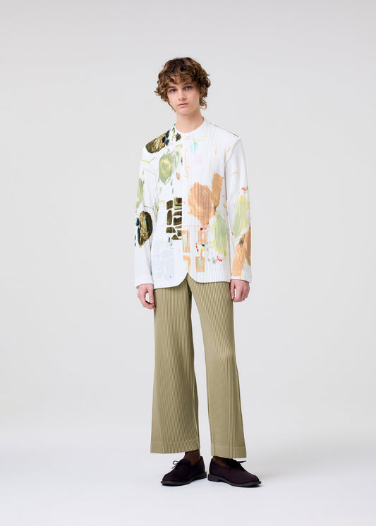 A model wears the HOMME PLISSÉ ISSEY MIYAKE PALETTE jacket.