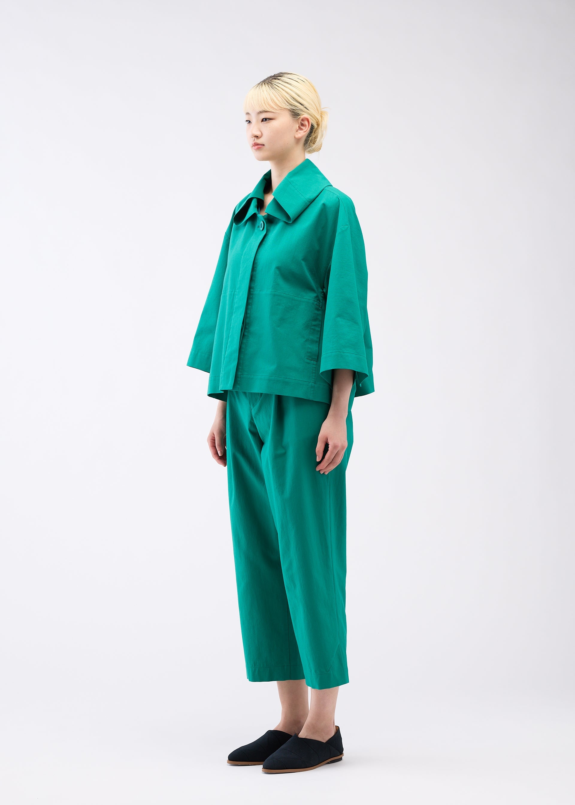 A model wears the 132 5. ISSEY MIYAKE WASHI STRETCH jacket.