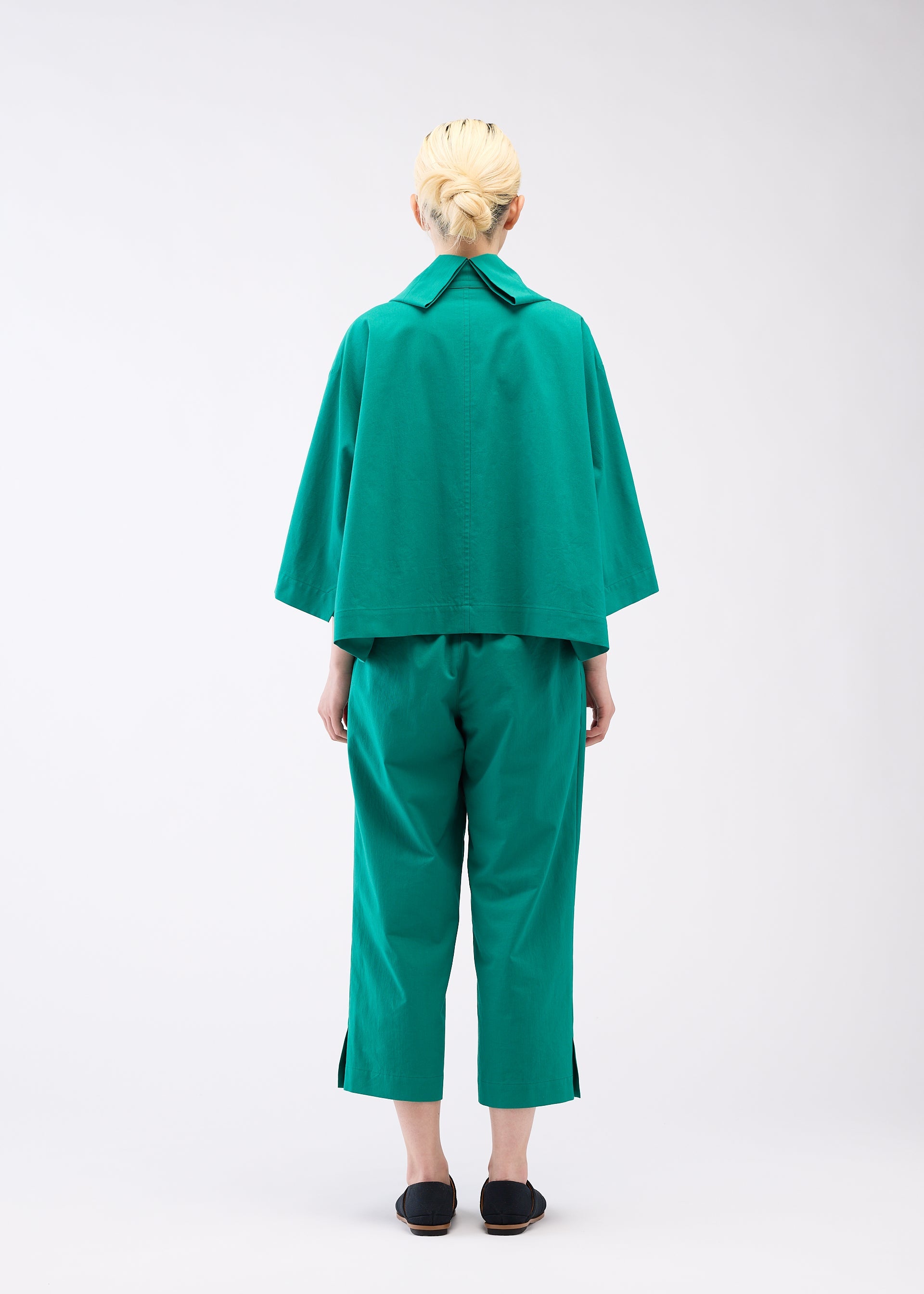 A model wears the 132 5. ISSEY MIYAKE WASHI STRETCH jacket.