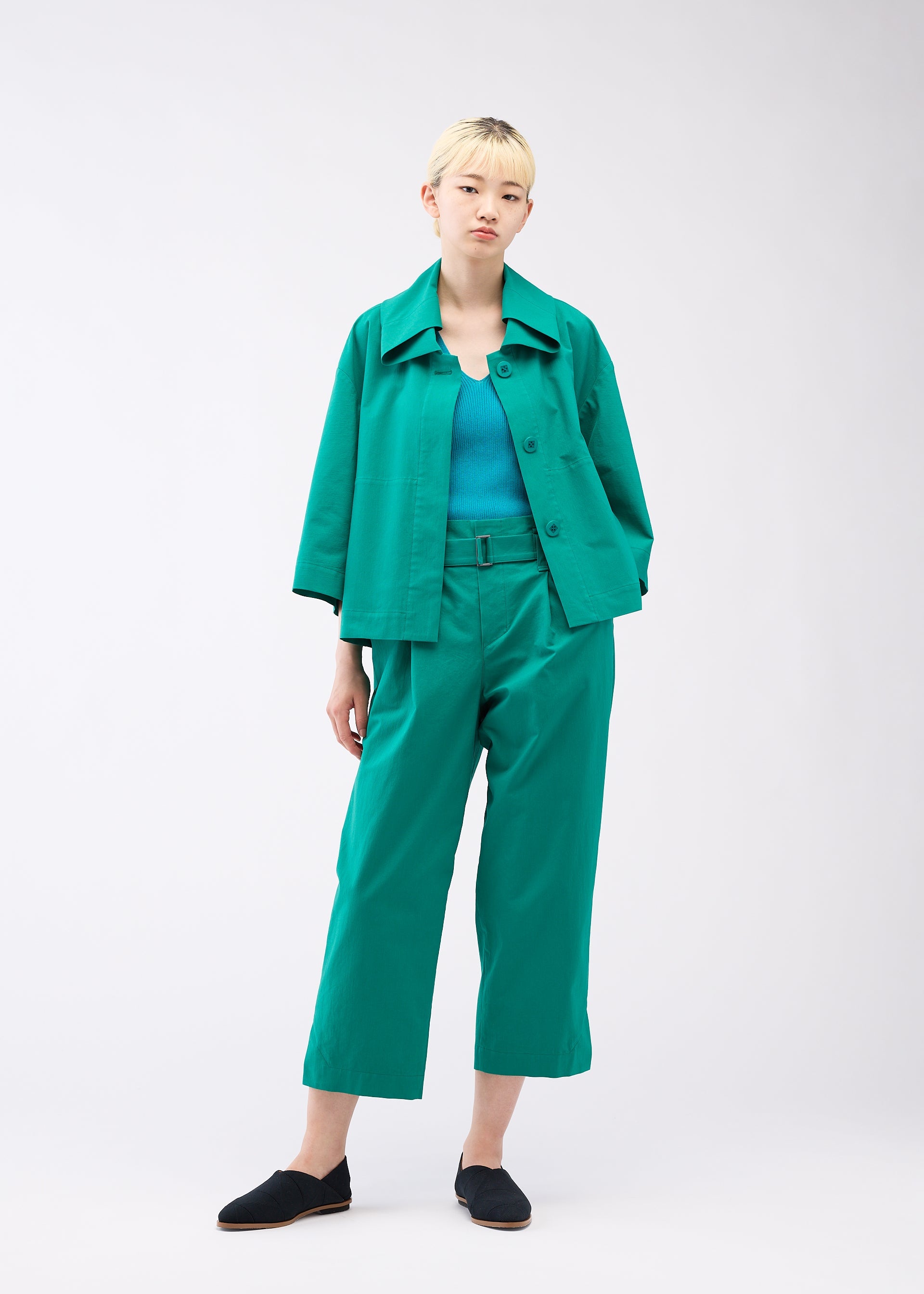 A model wears the 132 5. ISSEY MIYAKE WASHI STRETCH jacket.