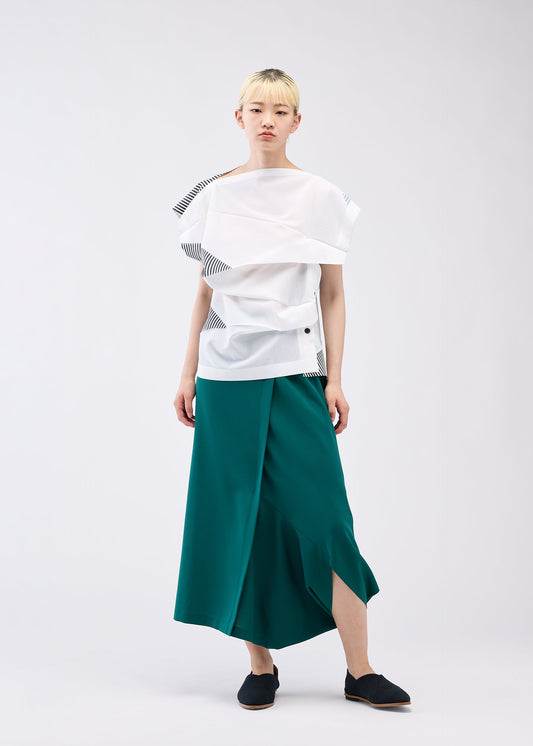 A model wears the 132 5. ISSEY MIYAKE FOLD RAMIE PRINT shirt.