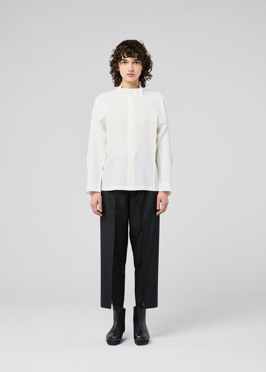 A model wears the 132 5. ISSEY MIYAKE FOLD SHIRT shirt.