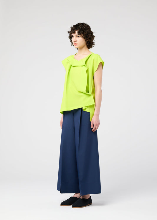 A model wears the 132 5. ISSEY MIYAKE FLAT TUCK T flat-tuck-t-shirt-white.