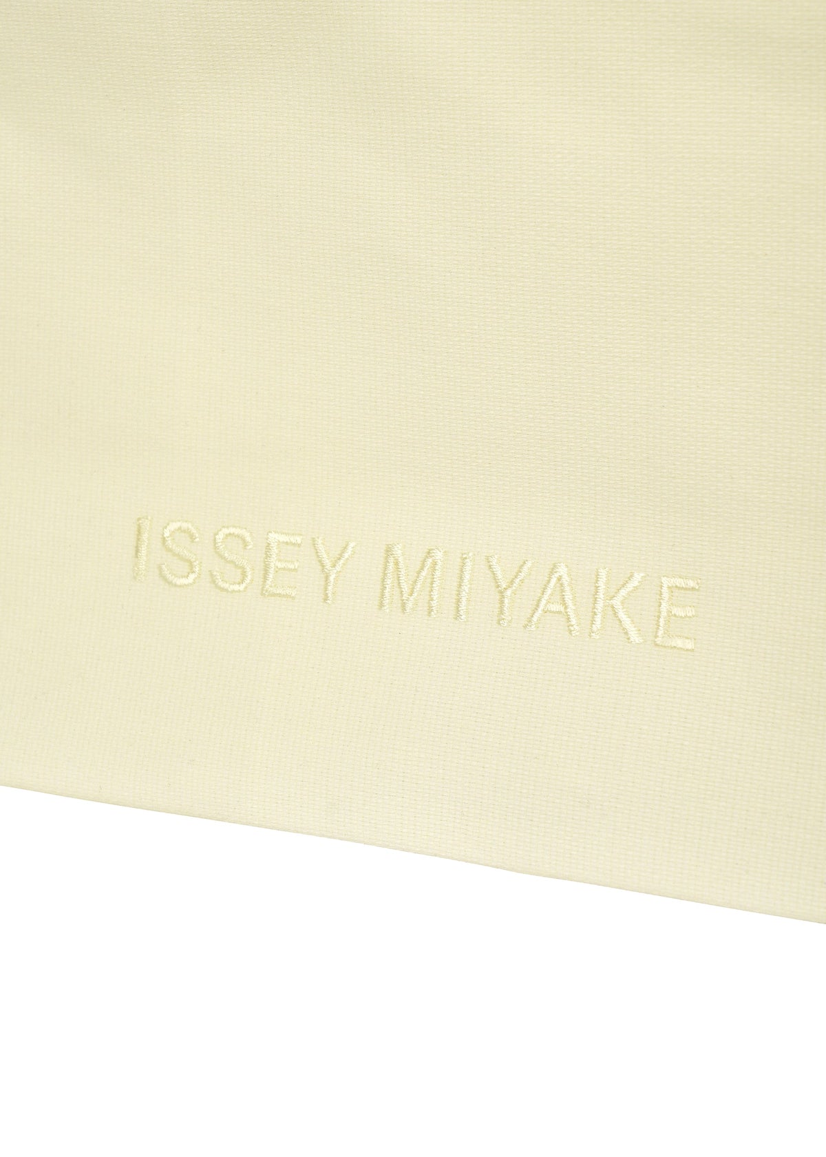 A detail shot of the ISSEY MIYAKE PAPER BAG bag.