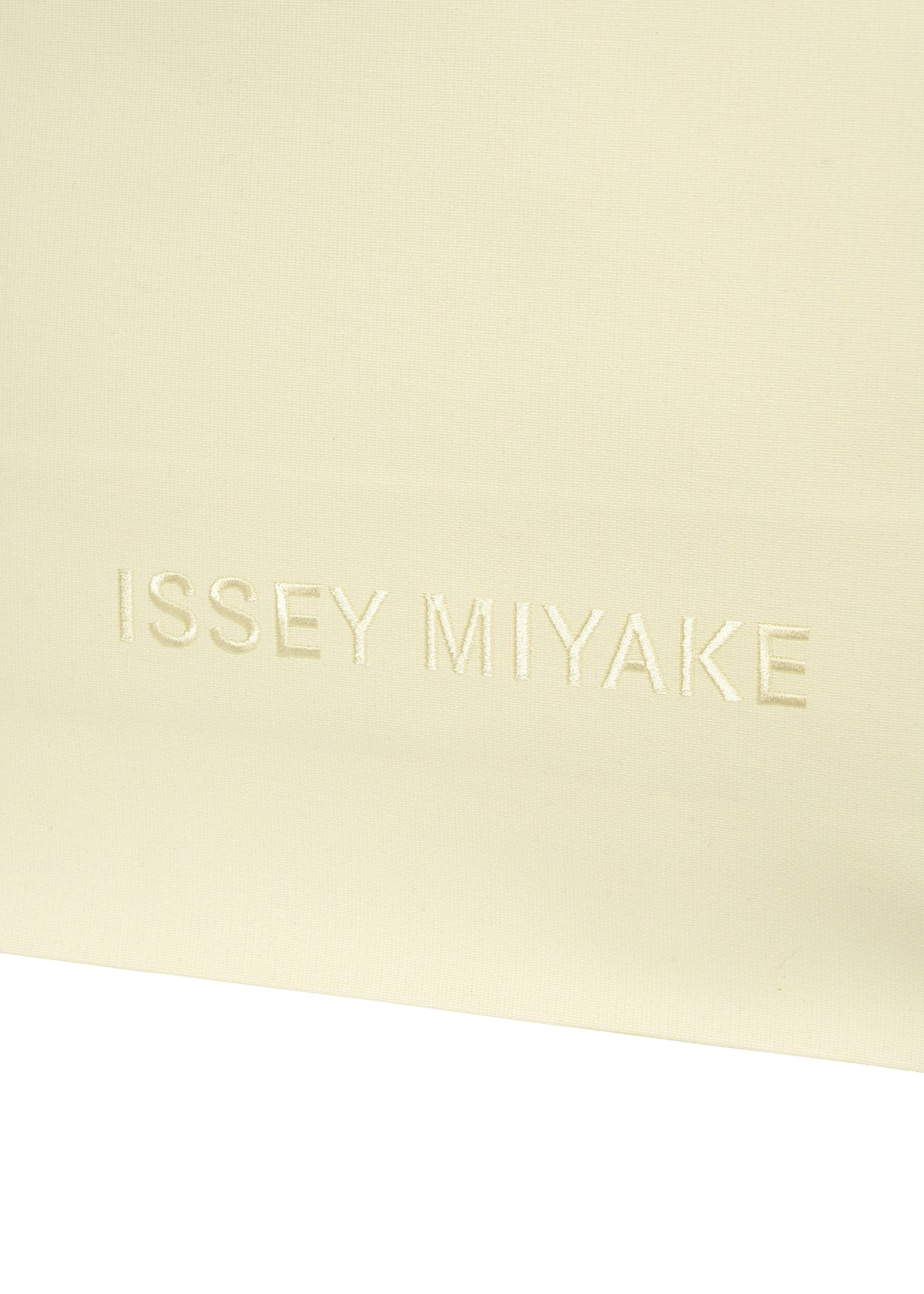 A detail shot of the ISSEY MIYAKE PAPER BAG bag.