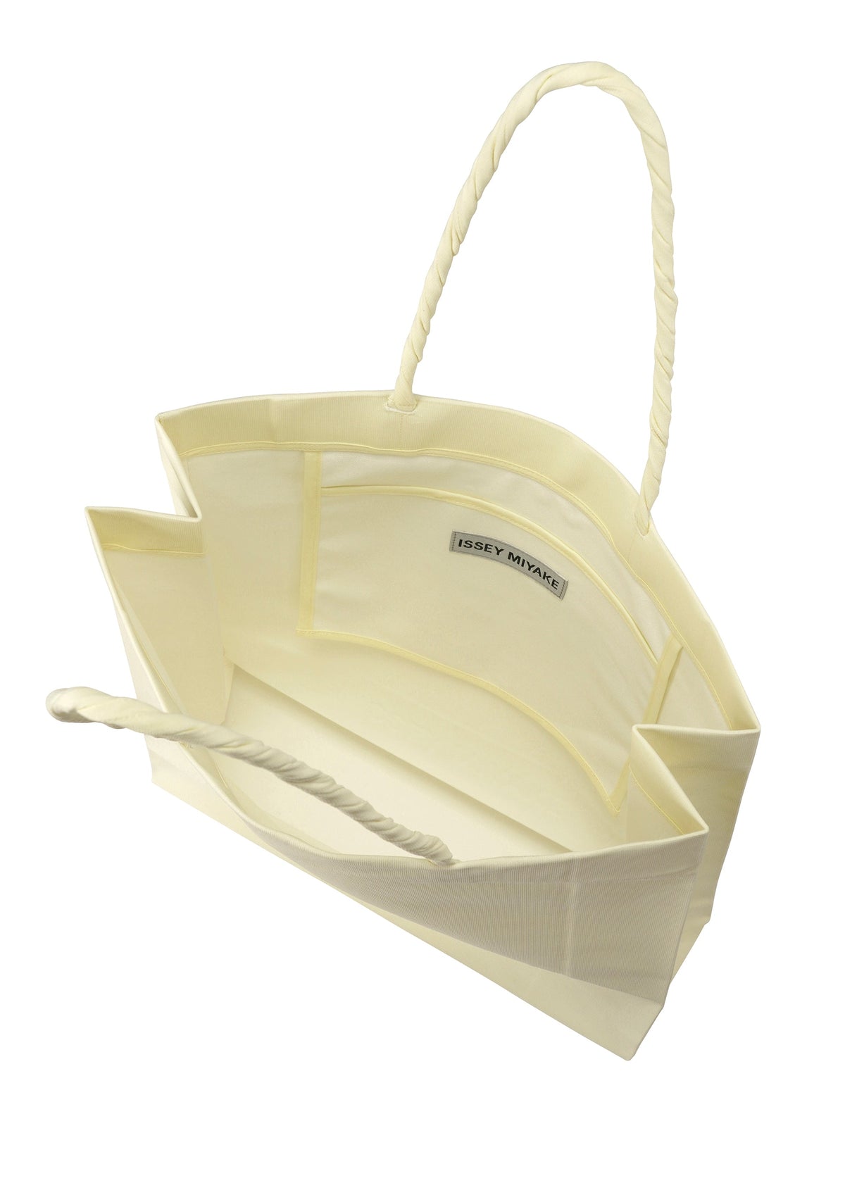 A detail shot of the ISSEY MIYAKE PAPER BAG bag.