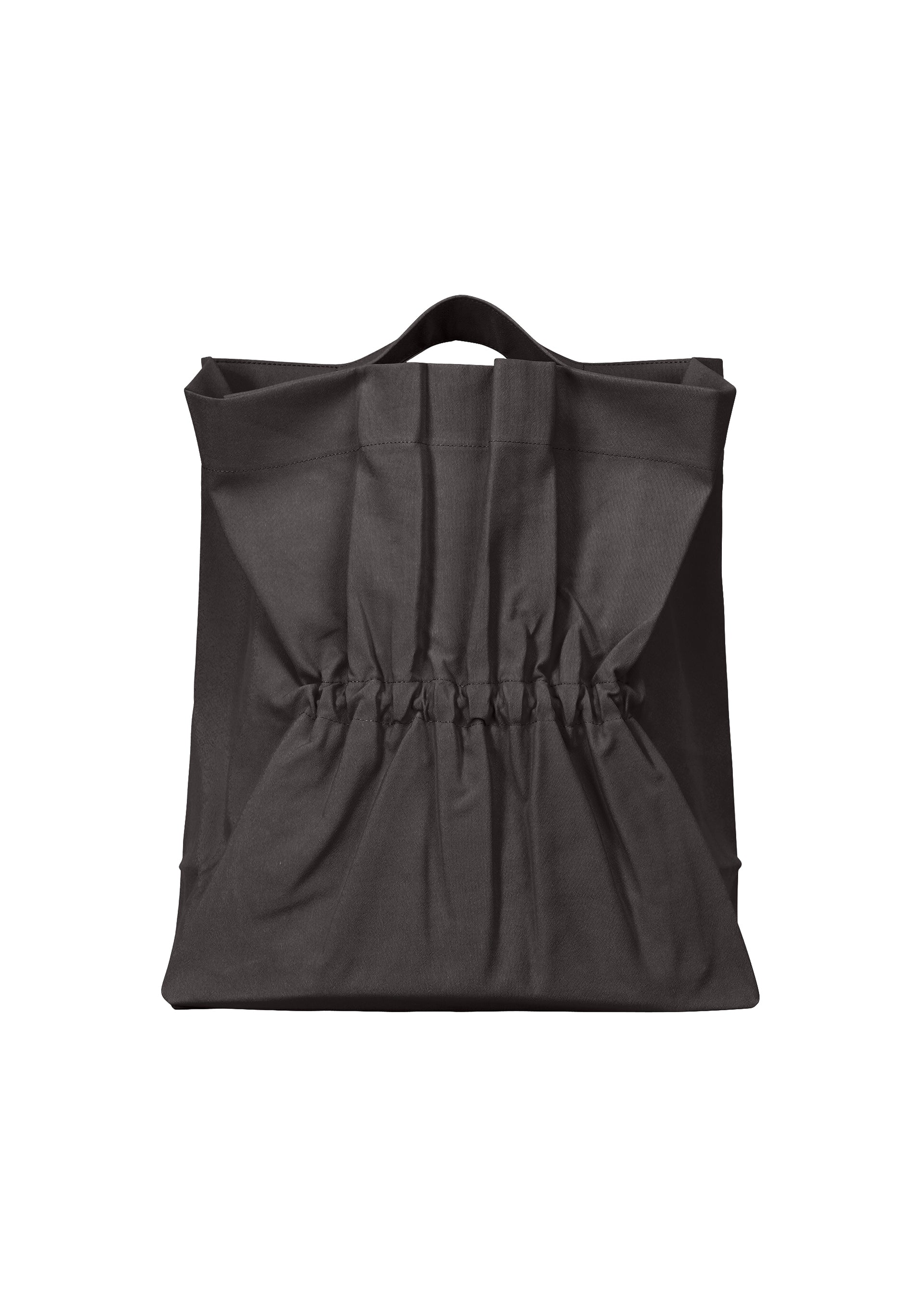 A product shot of the ISSEY MIYAKE DRAWN AND PRESSED bag in black (15).