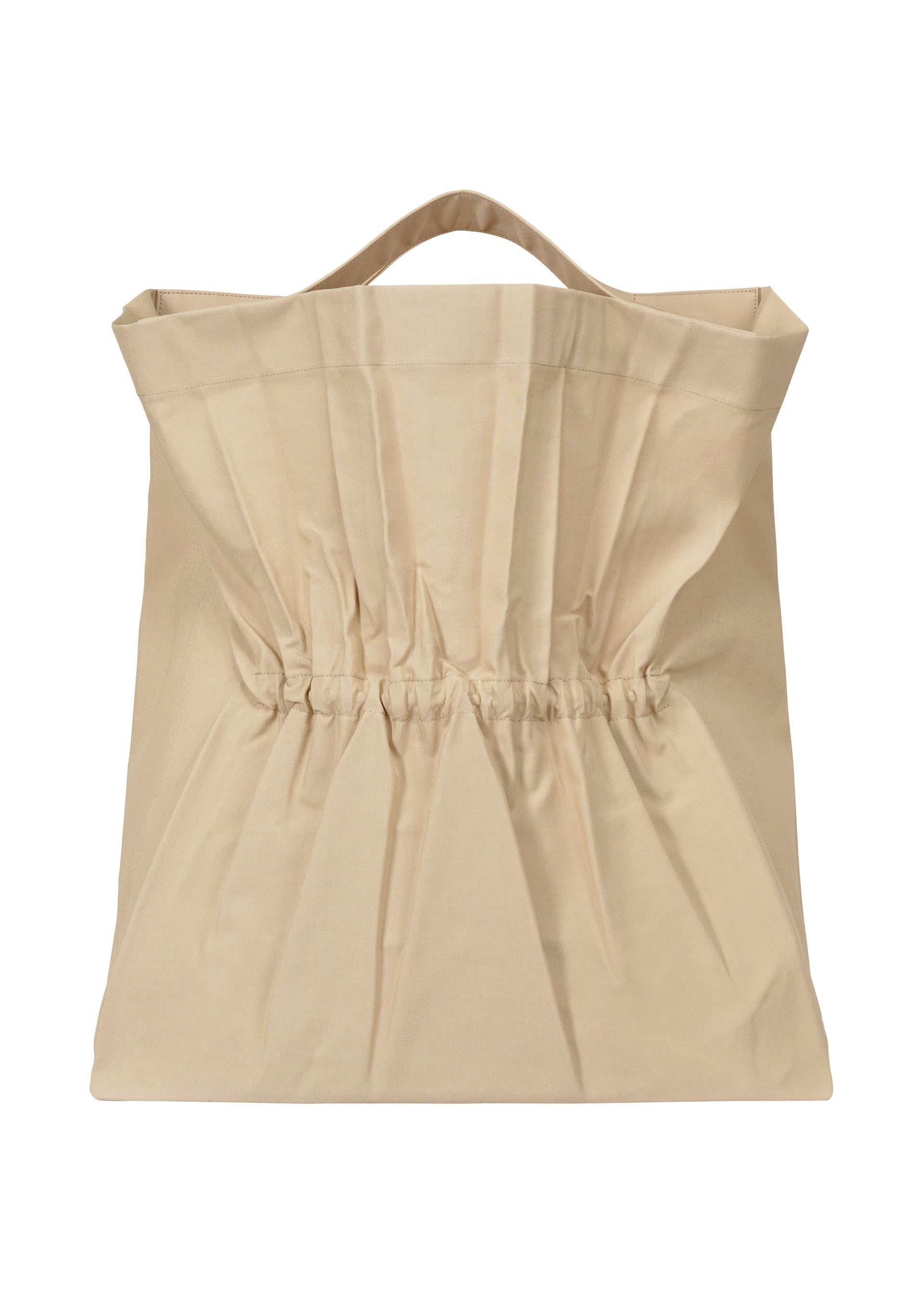A product shot of the ISSEY MIYAKE DRAWN AND PRESSED bag in oaka beige (48).