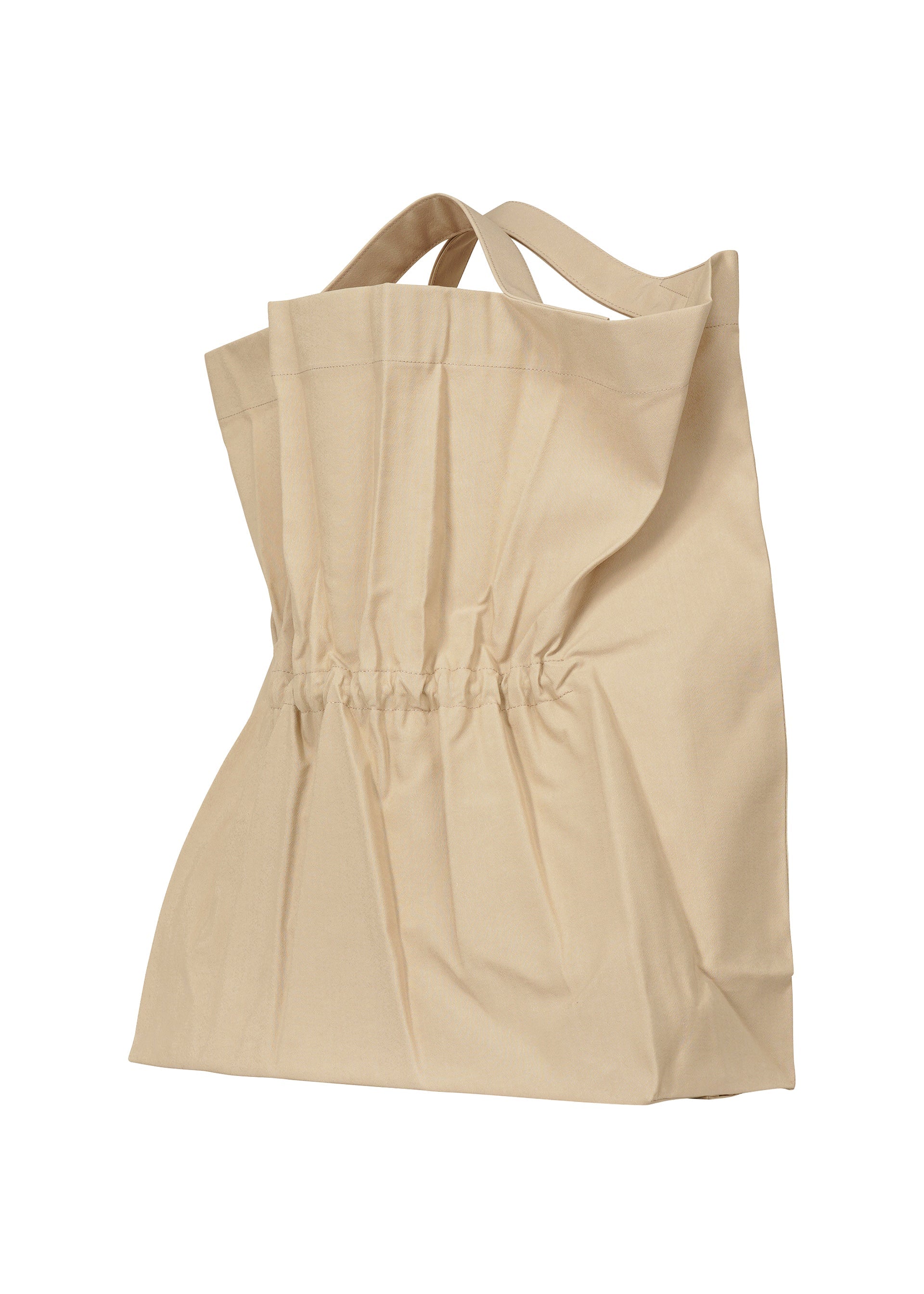 A detail shot of the ISSEY MIYAKE DRAWN AND PRESSED bag.