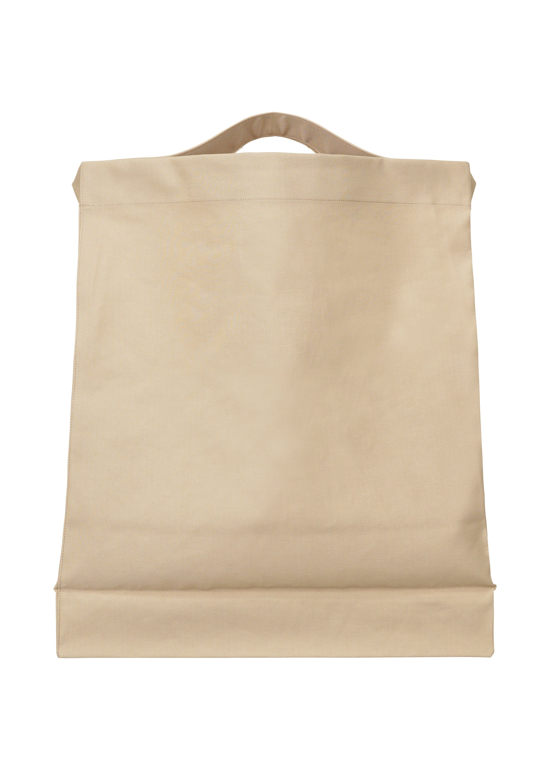A detail shot of the ISSEY MIYAKE DRAWN AND PRESSED bag.