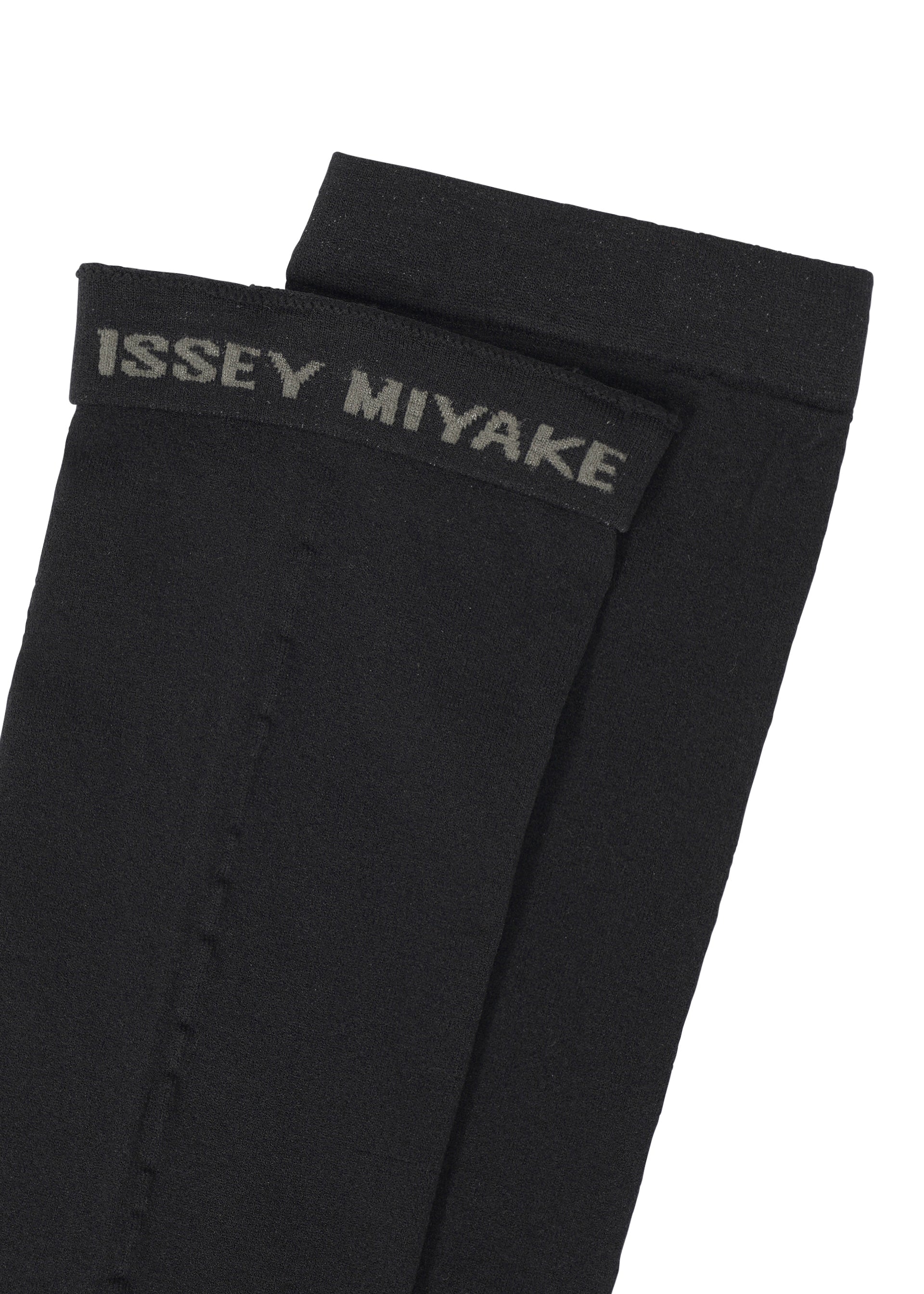 A detail shot of the ISSEY MIYAKE SHEER SOCKS socks.