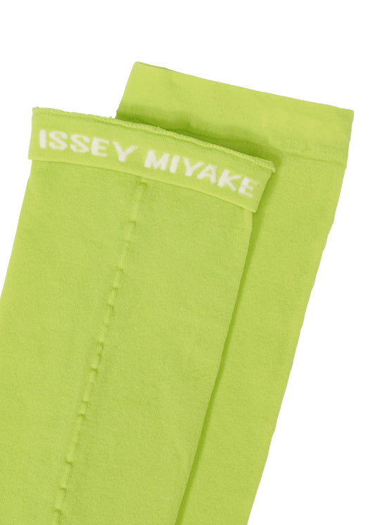 A detail shot of the ISSEY MIYAKE SHEER SOCKS socks.