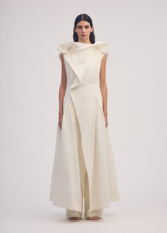 A model wears the ISSEY MIYAKE AMPLE vest.