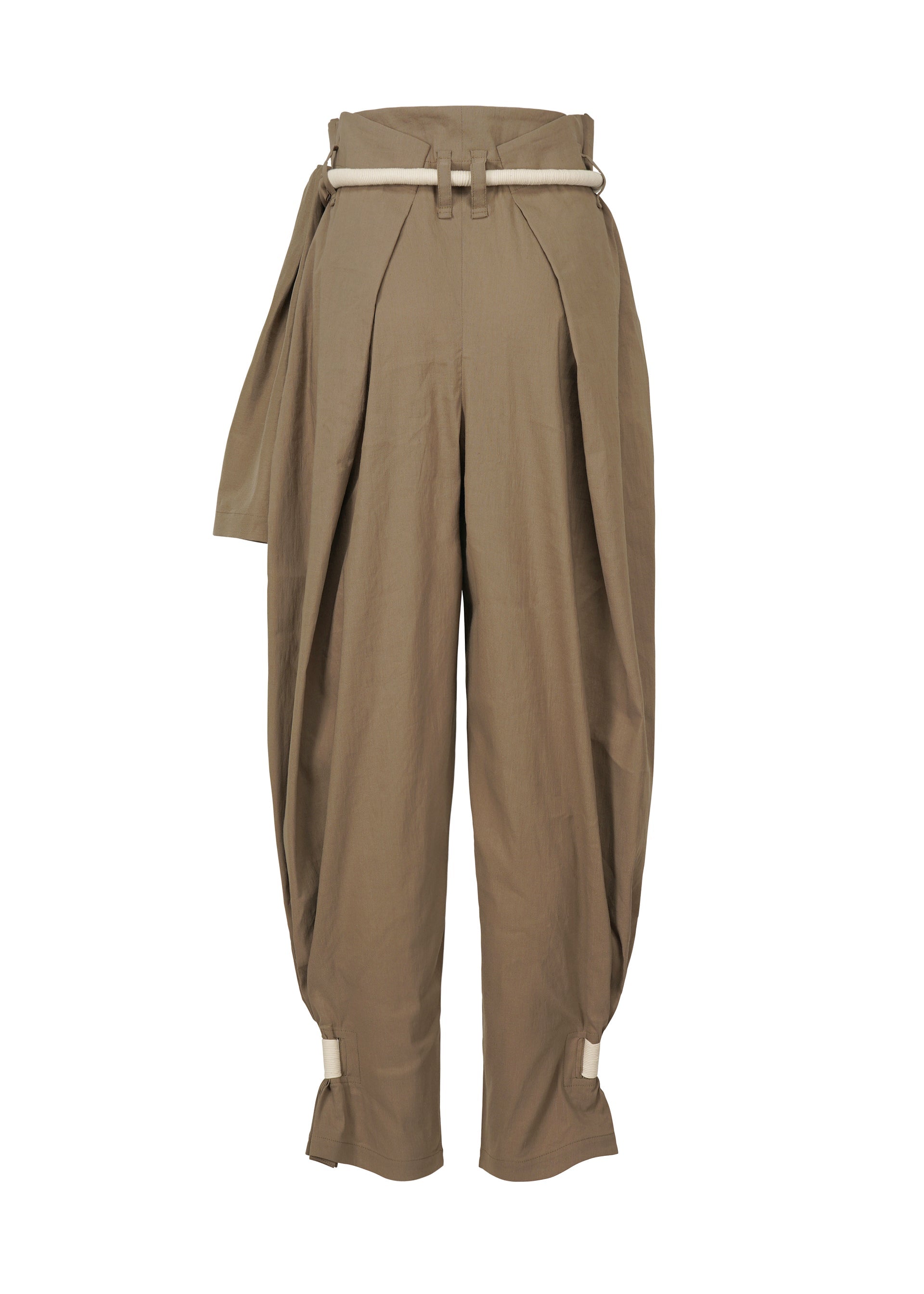 A detail shot of the ISSEY MIYAKE CLOTH AND CORD trousers.