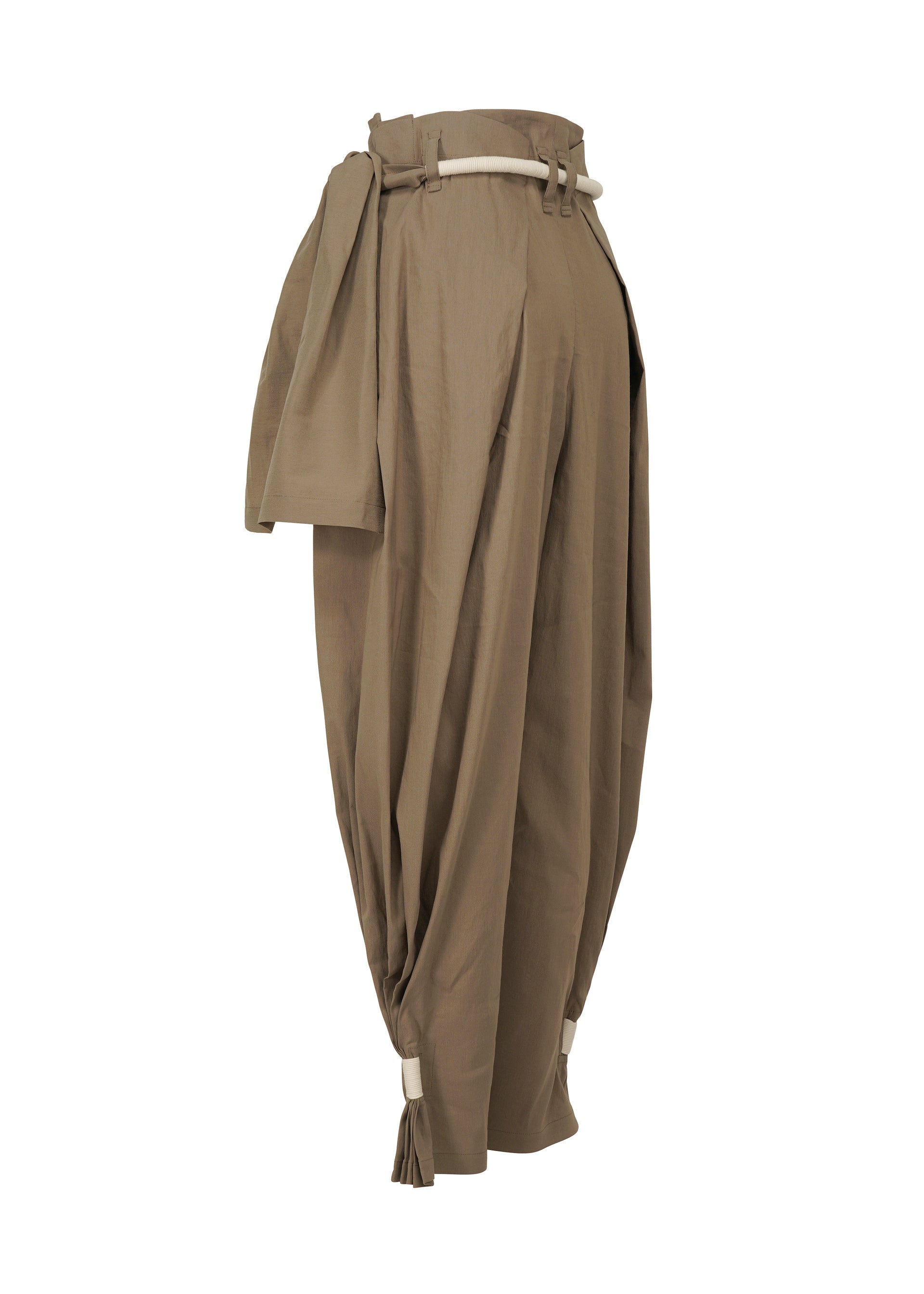 A detail shot of the ISSEY MIYAKE CLOTH AND CORD trousers.