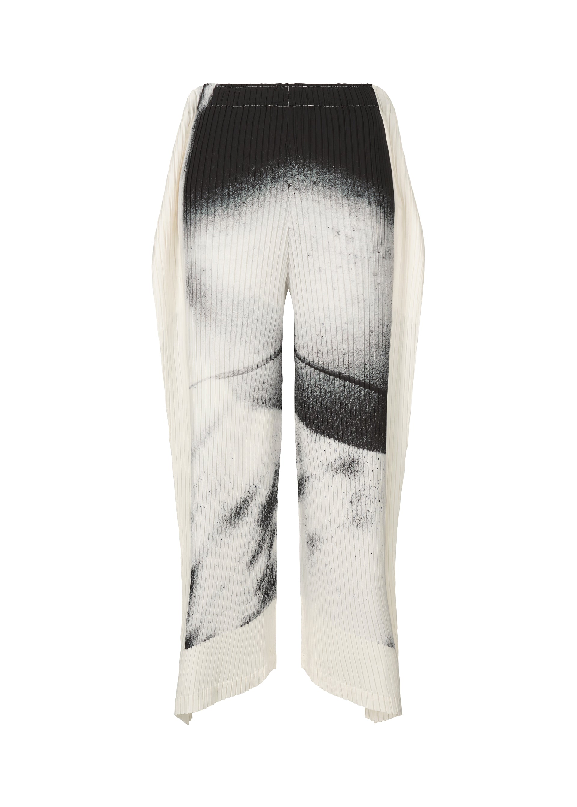 A product shot of the ISSEY MIYAKE SHADOW STUDY PLEATS trousers in .