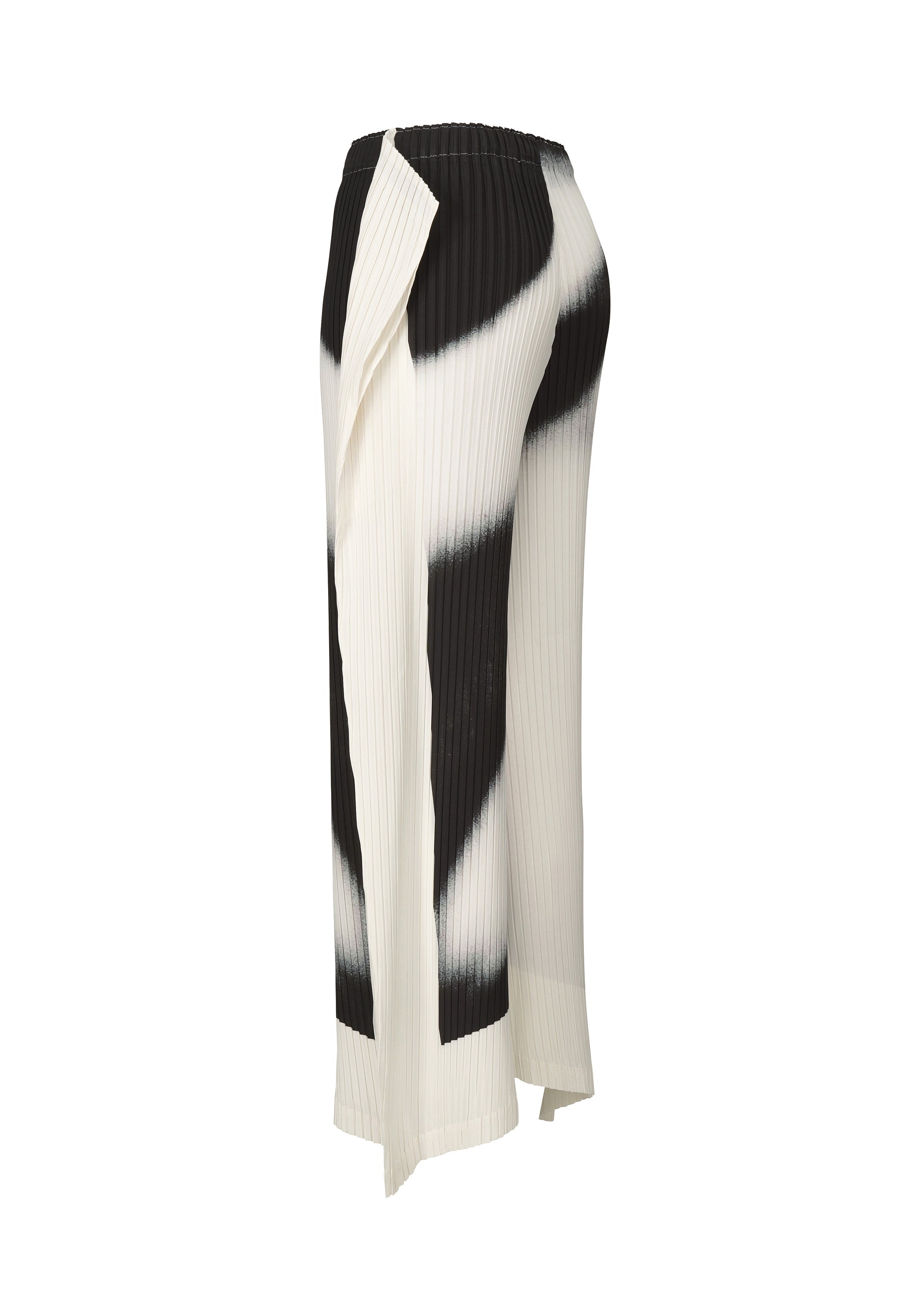 A detail shot of the ISSEY MIYAKE SHADOW STUDY PLEATS trousers.