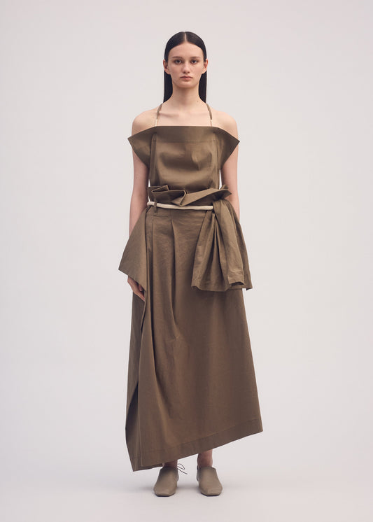 A model wears the ISSEY MIYAKE CLOTH AND CORD skirt.